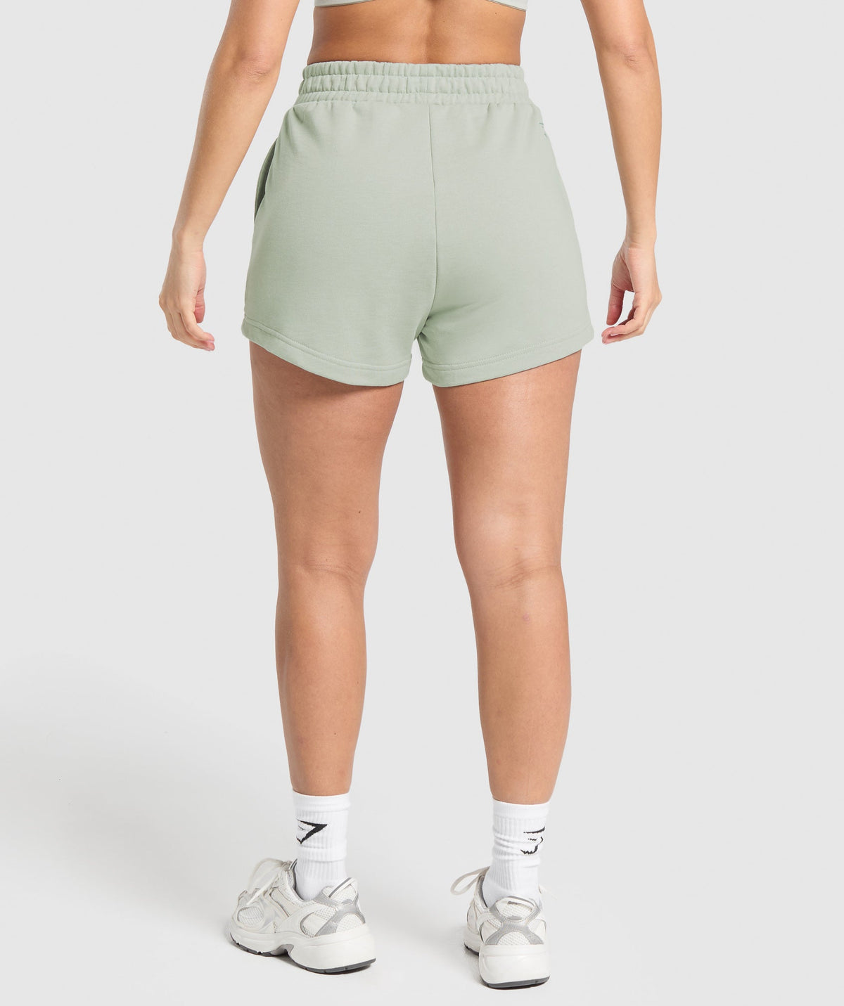 gymshark-campus-classics-graphic-sweat-shorts-stone-grey-ss25