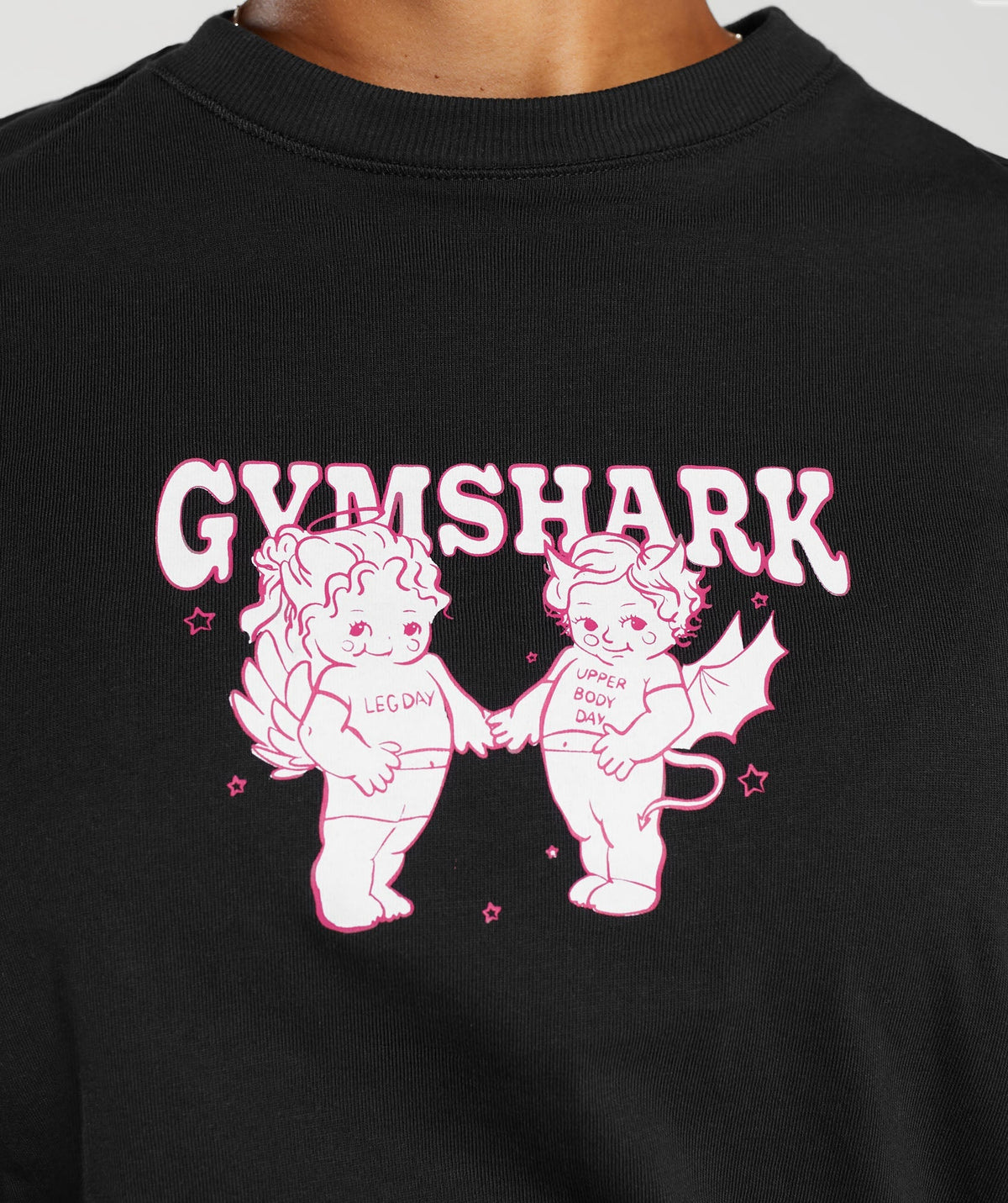 gymshark-cherub-graphic-long-sleeve-top-black-aw23