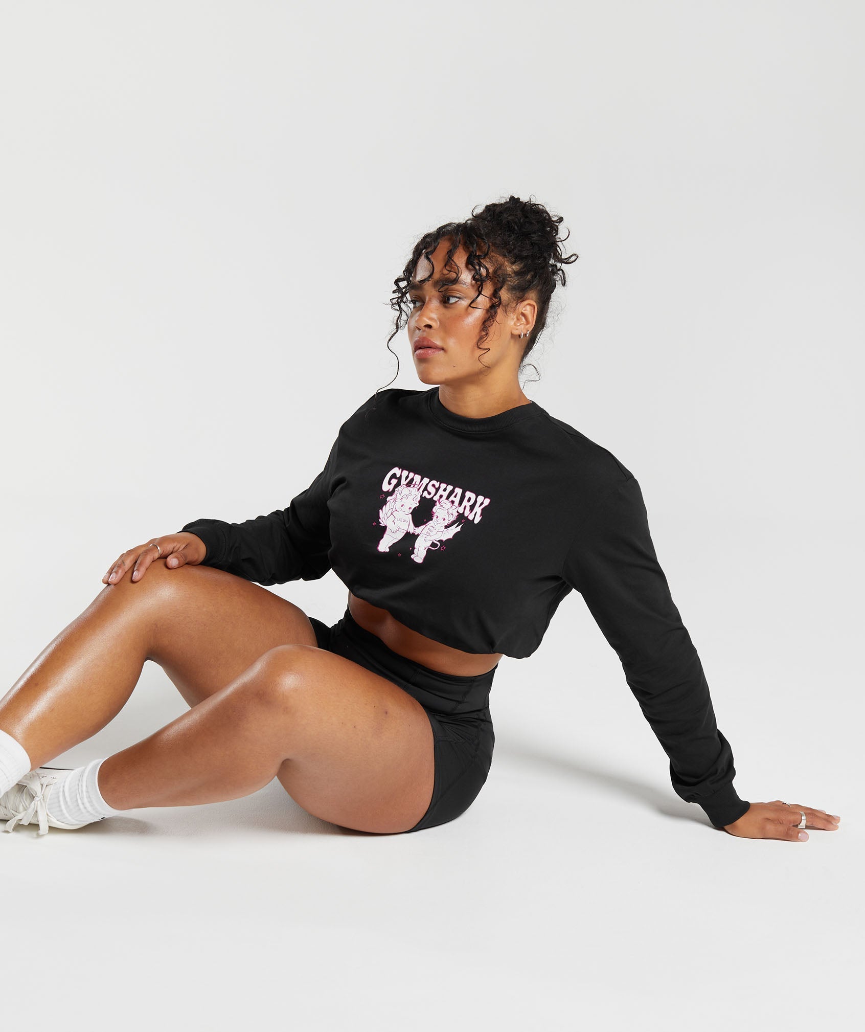 gymshark-cherub-graphic-long-sleeve-top-black-aw23