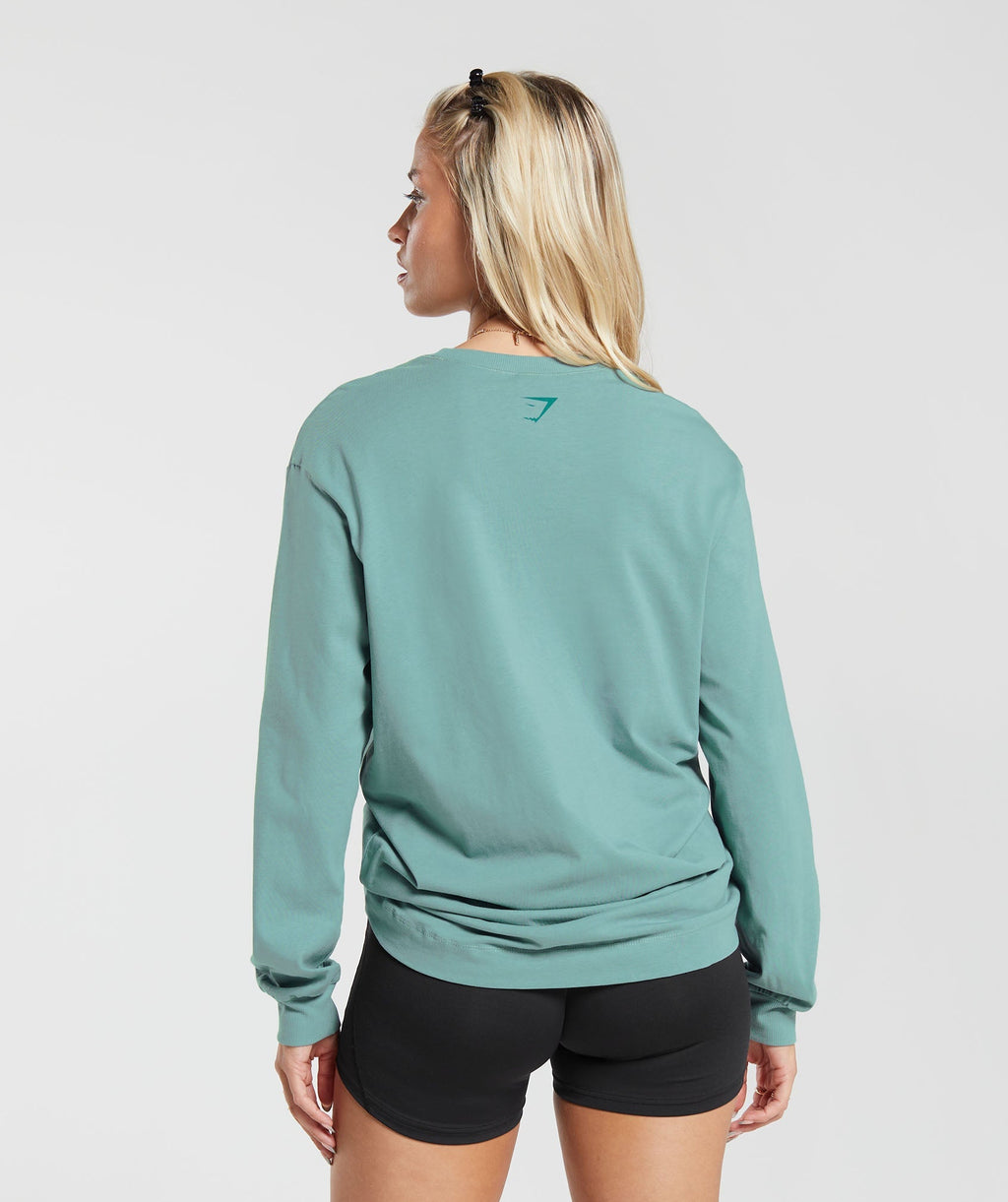 gymshark-cherub-graphic-long-sleeve-top-duck-egg-blue-aw23