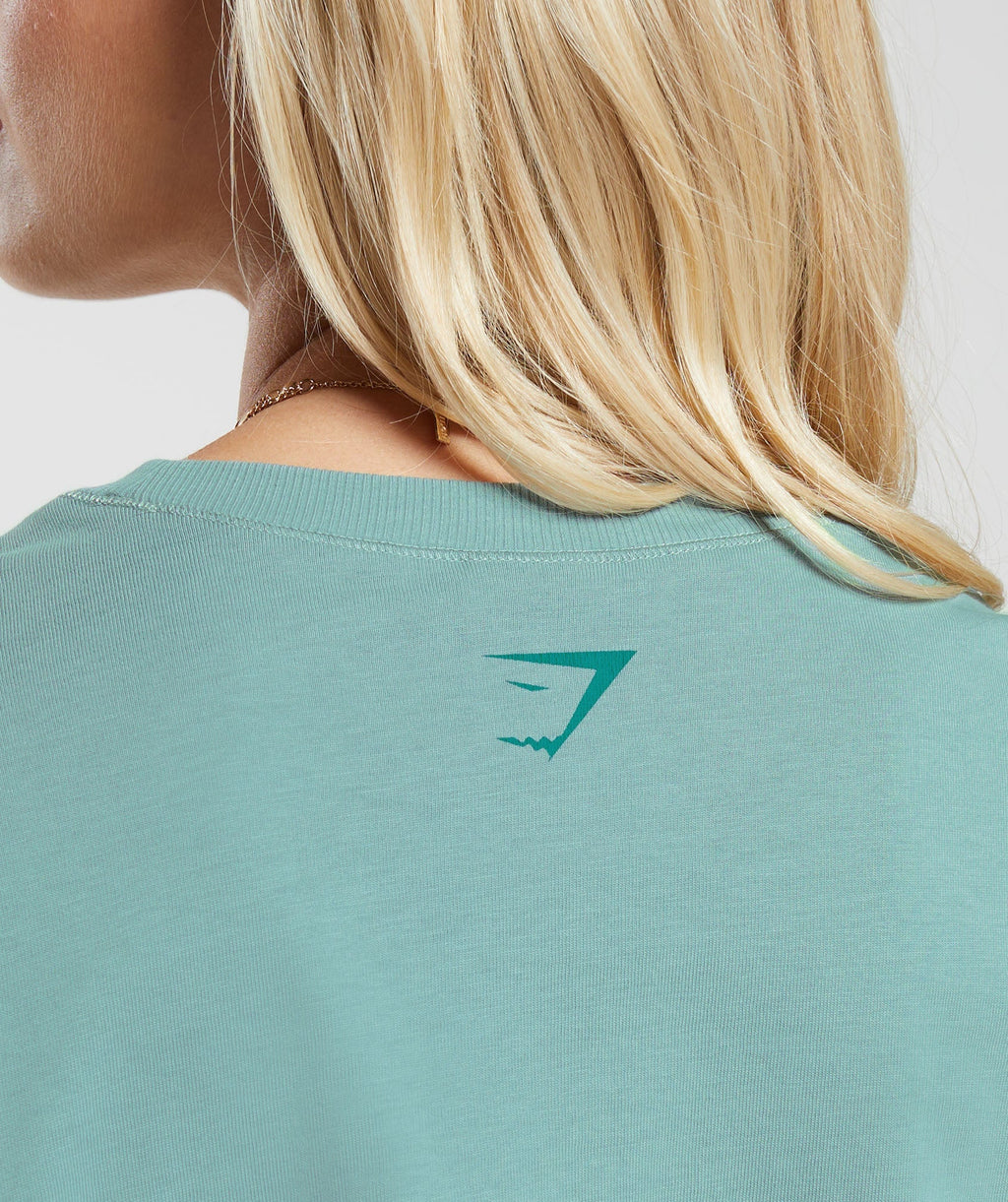gymshark-cherub-graphic-long-sleeve-top-duck-egg-blue-aw23