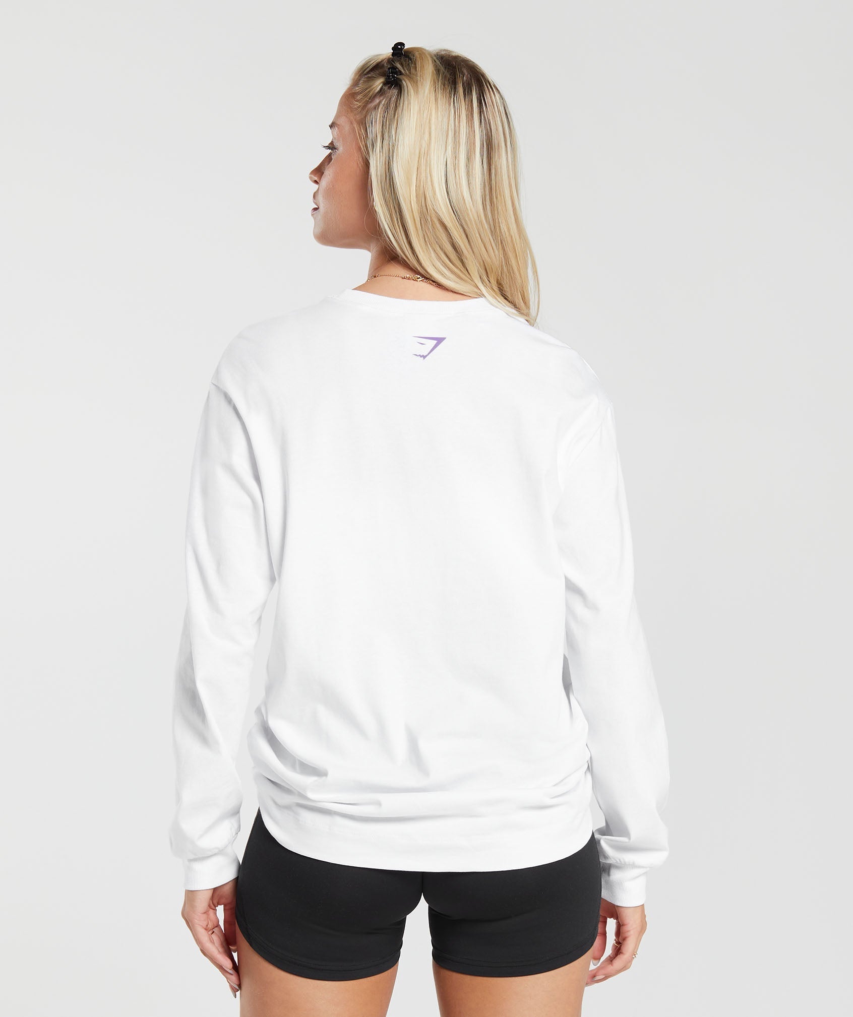 gymshark-cherub-graphic-long-sleeve-top-white-aw23