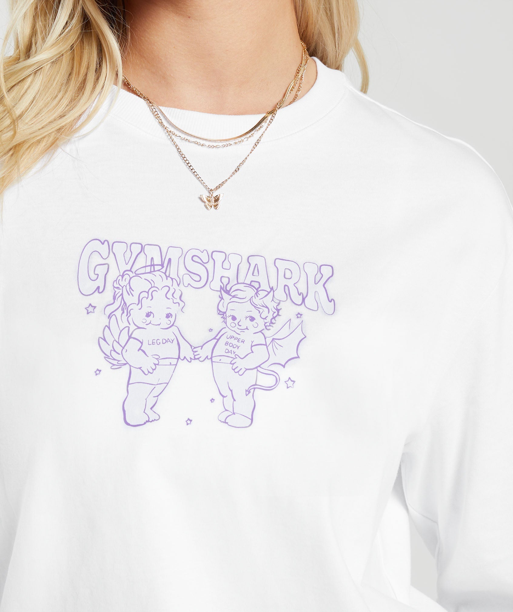 gymshark-cherub-graphic-long-sleeve-top-white-aw23