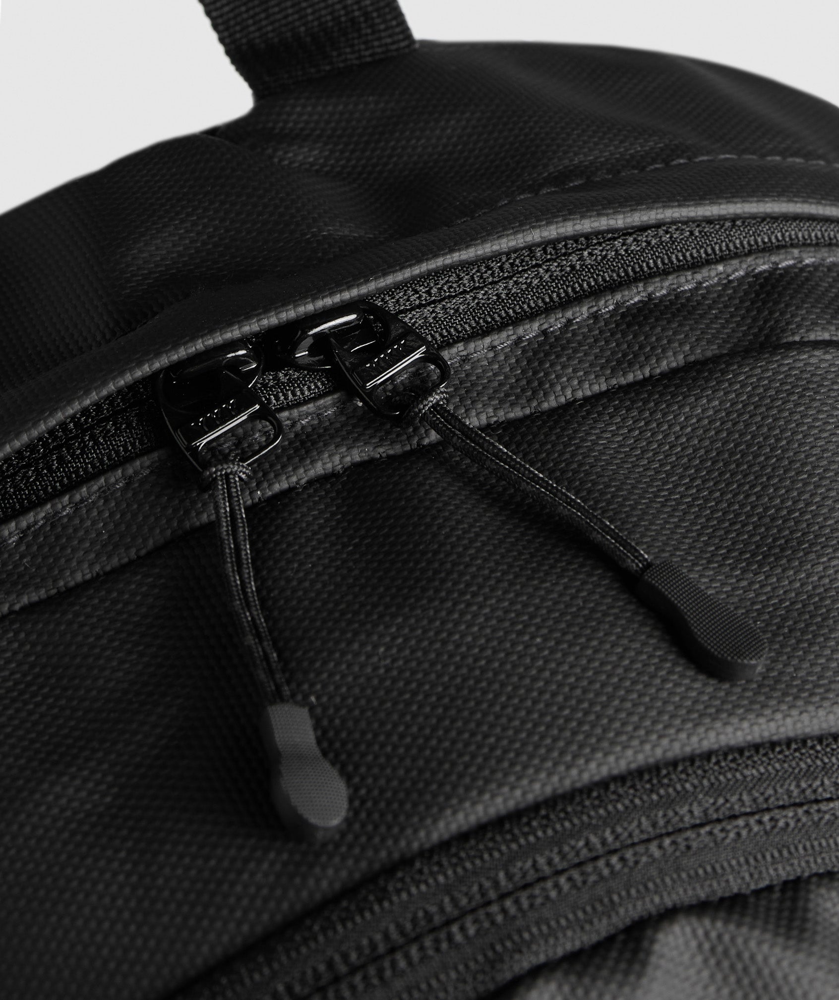 gymshark-coated-pursuit-backpack-black-aw24
