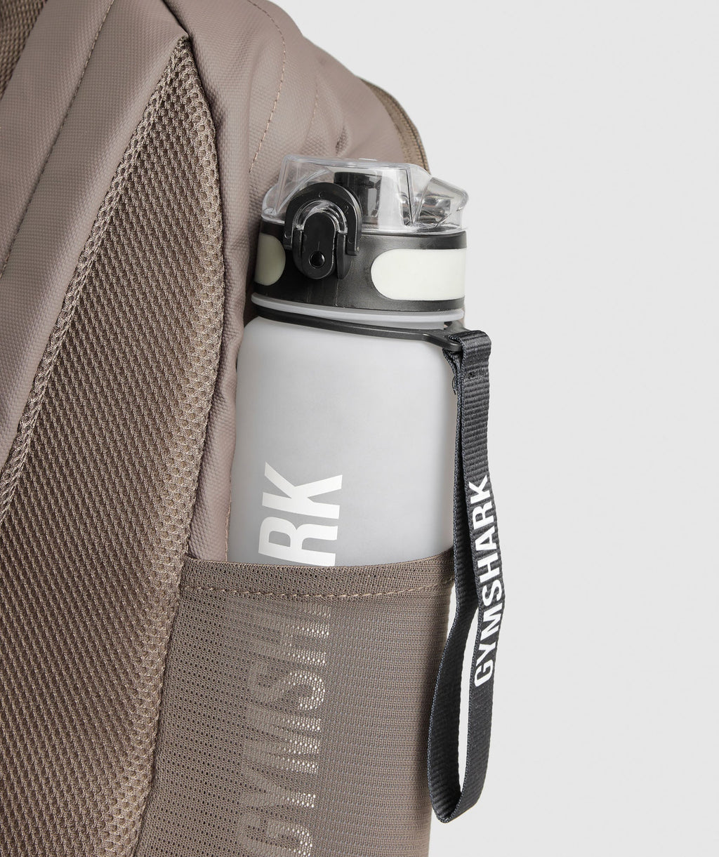 gymshark-coated-pursuit-backpack-camo-brown-cement-brown-aw24