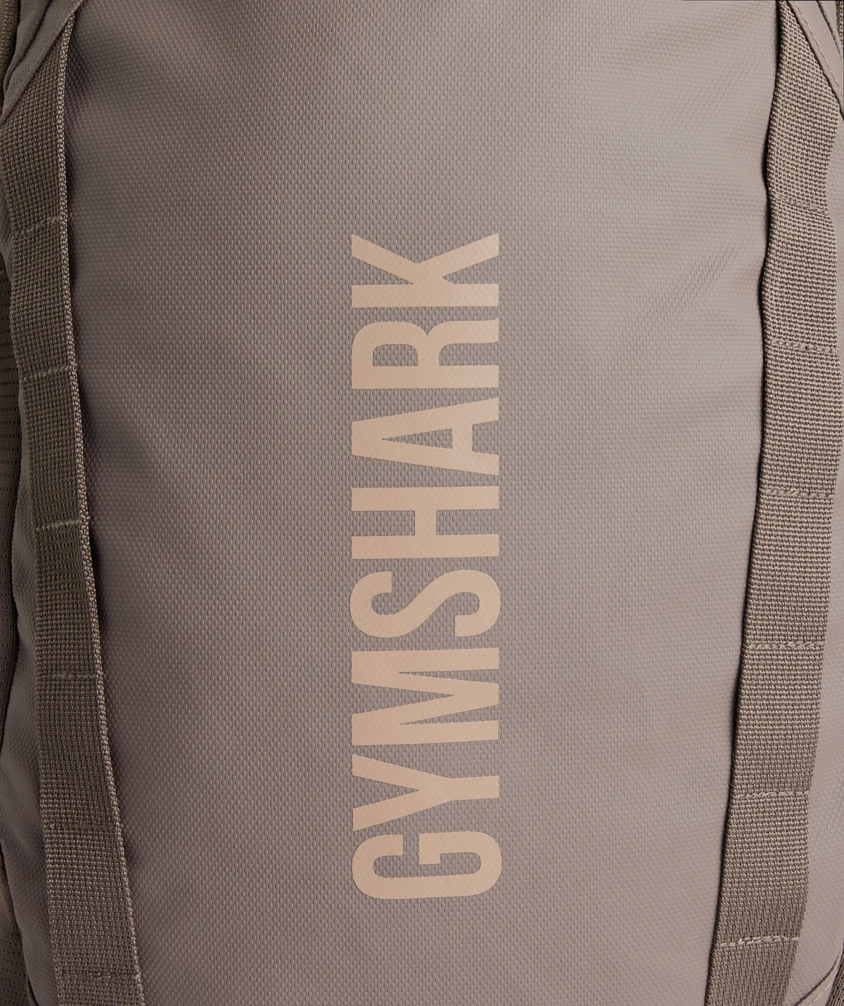 gymshark-coated-pursuit-backpack-camo-brown-cement-brown-aw24