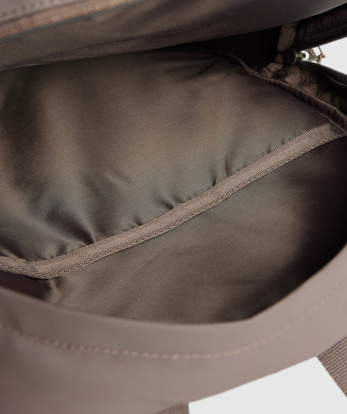 gymshark-coated-pursuit-backpack-camo-brown-cement-brown-aw24