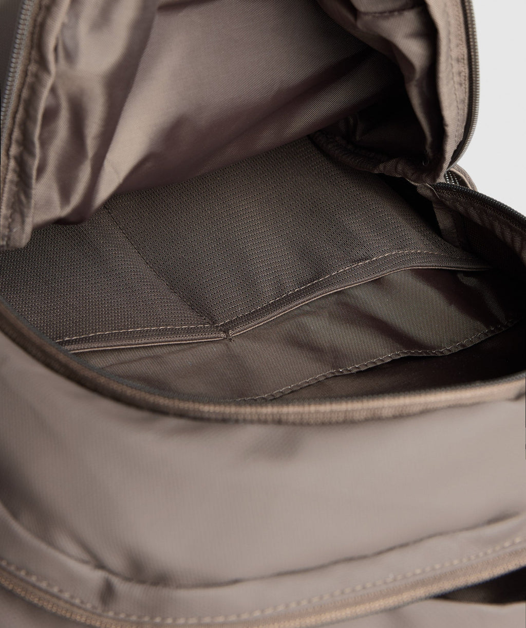 gymshark-coated-pursuit-backpack-camo-brown-cement-brown-aw24