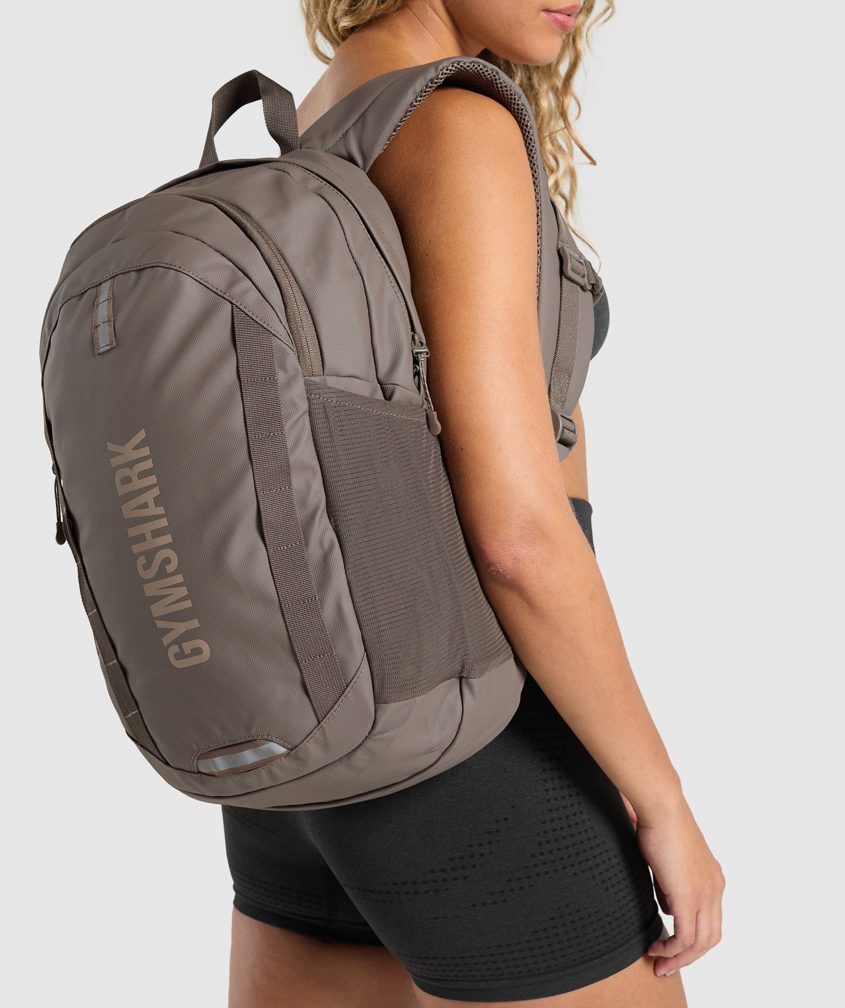 gymshark-coated-pursuit-backpack-camo-brown-cement-brown-aw24