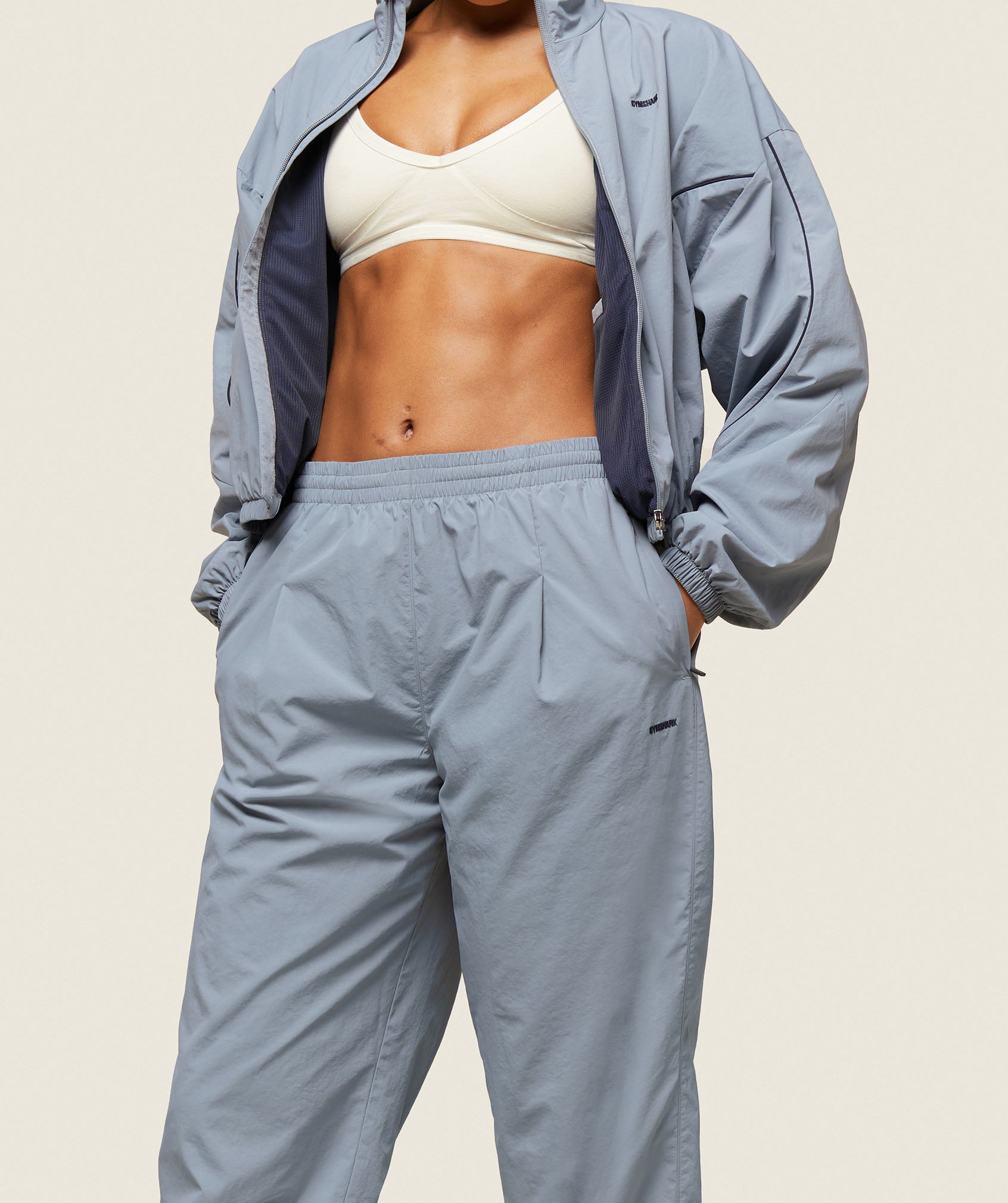 gymshark-everywear-retro-track-pants-denim-grey-heavy-blue-ss24