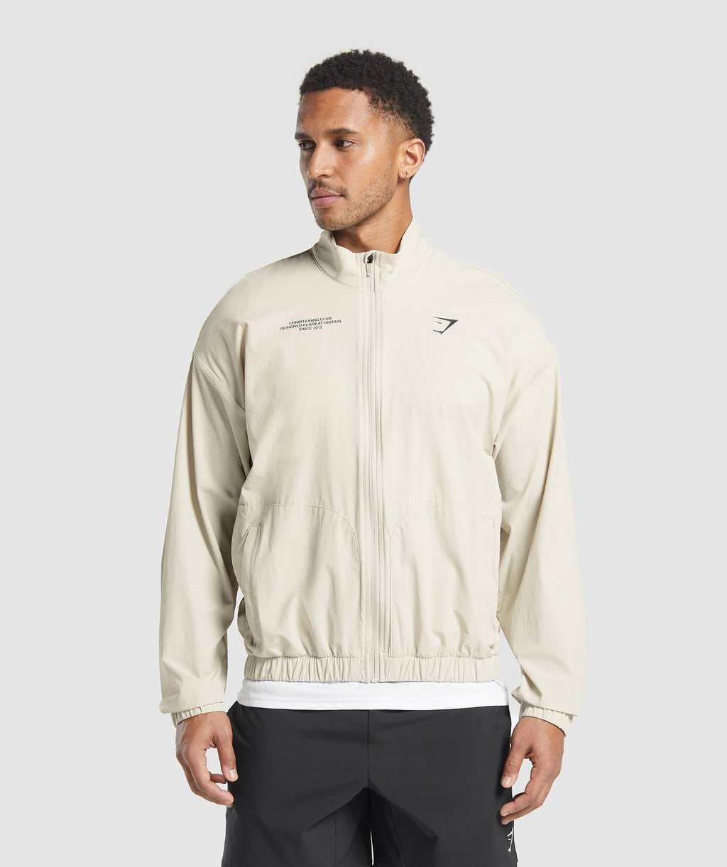 gymshark-conditioning-club-track-jacket-pebble-grey-ss25