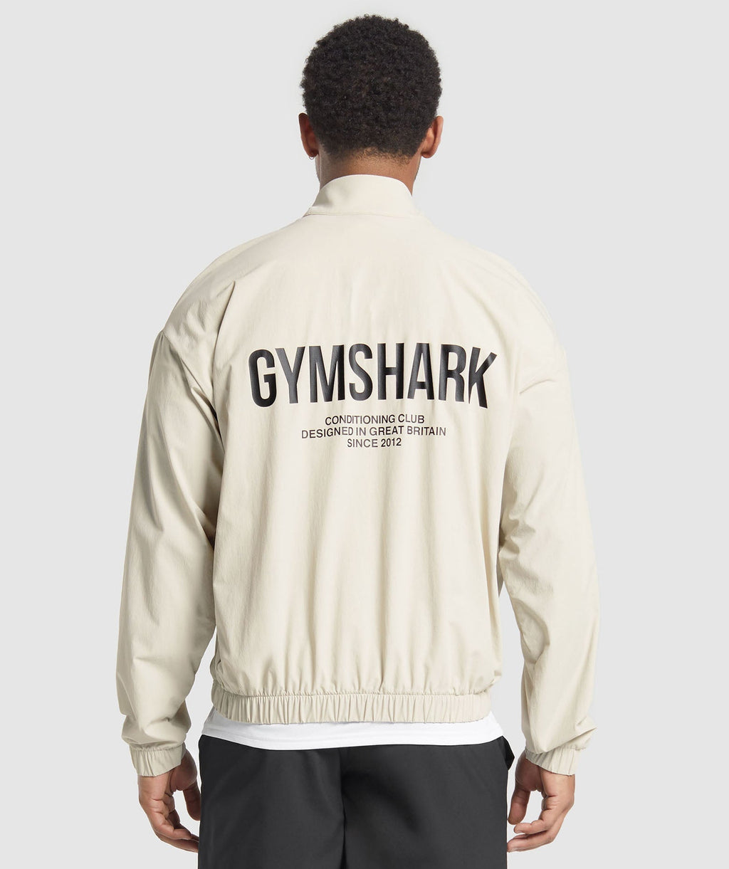 gymshark-conditioning-club-track-jacket-pebble-grey-ss25