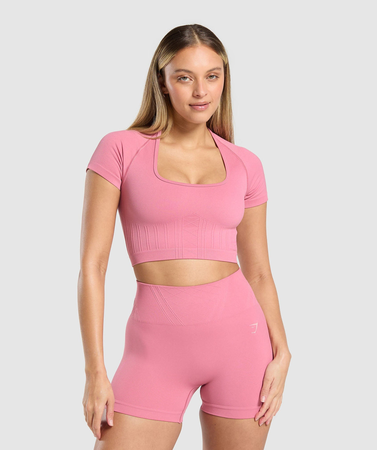 gymshark-corset-seamless-crop-top-sunset-pink-ss25
