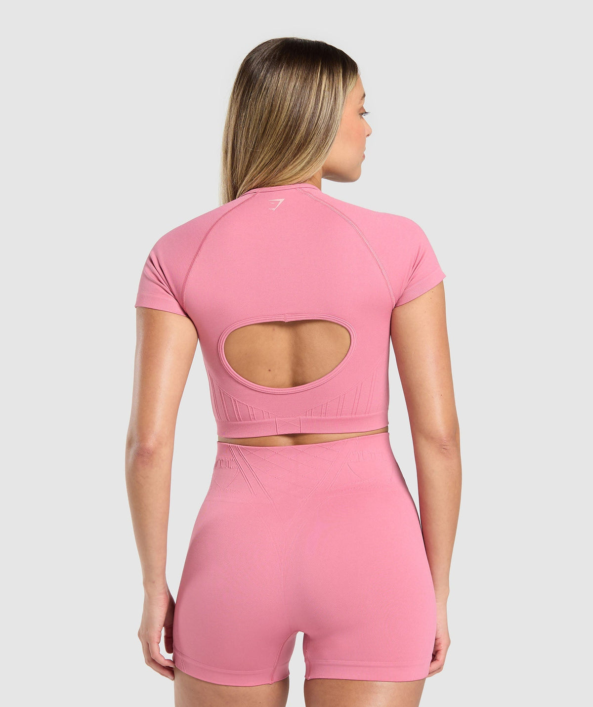 gymshark-corset-seamless-crop-top-sunset-pink-ss25