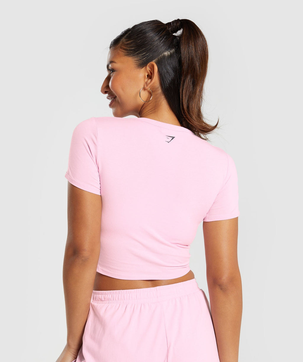 gymshark-cotton-graphic-crop-top-dolly-pink-ss24