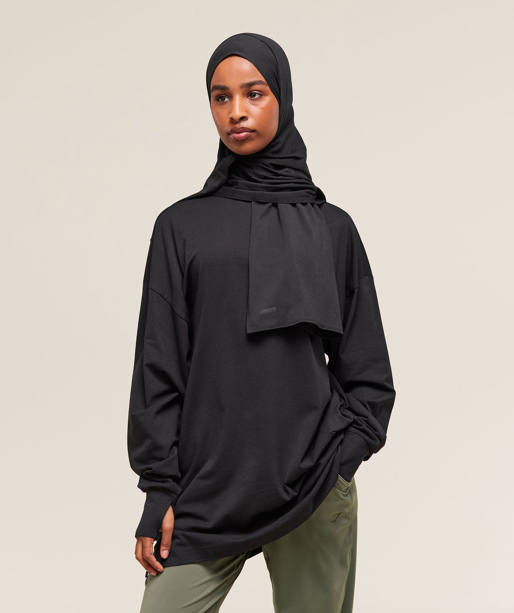 gymshark-covered-longline-cotton-long-sleeve-top-black-ss25
