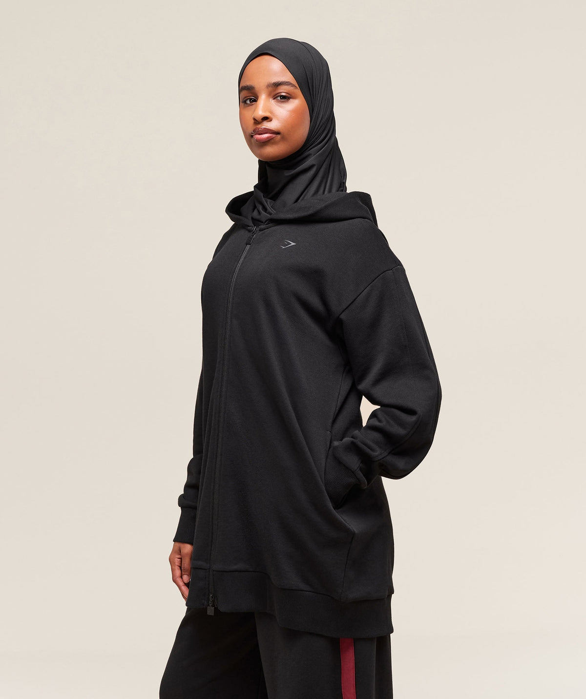 gymshark-covered-longline-zip-up-hoodie-black-ss25