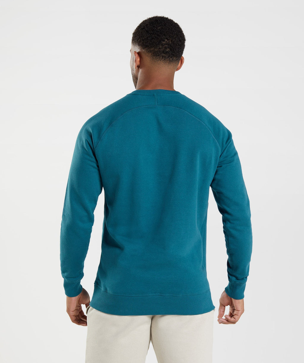 gymshark-crest-sweatshirt-atlantic-blue-aw22