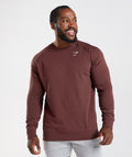 gymshark-crest-sweatshirt-cherry-brown-aw22