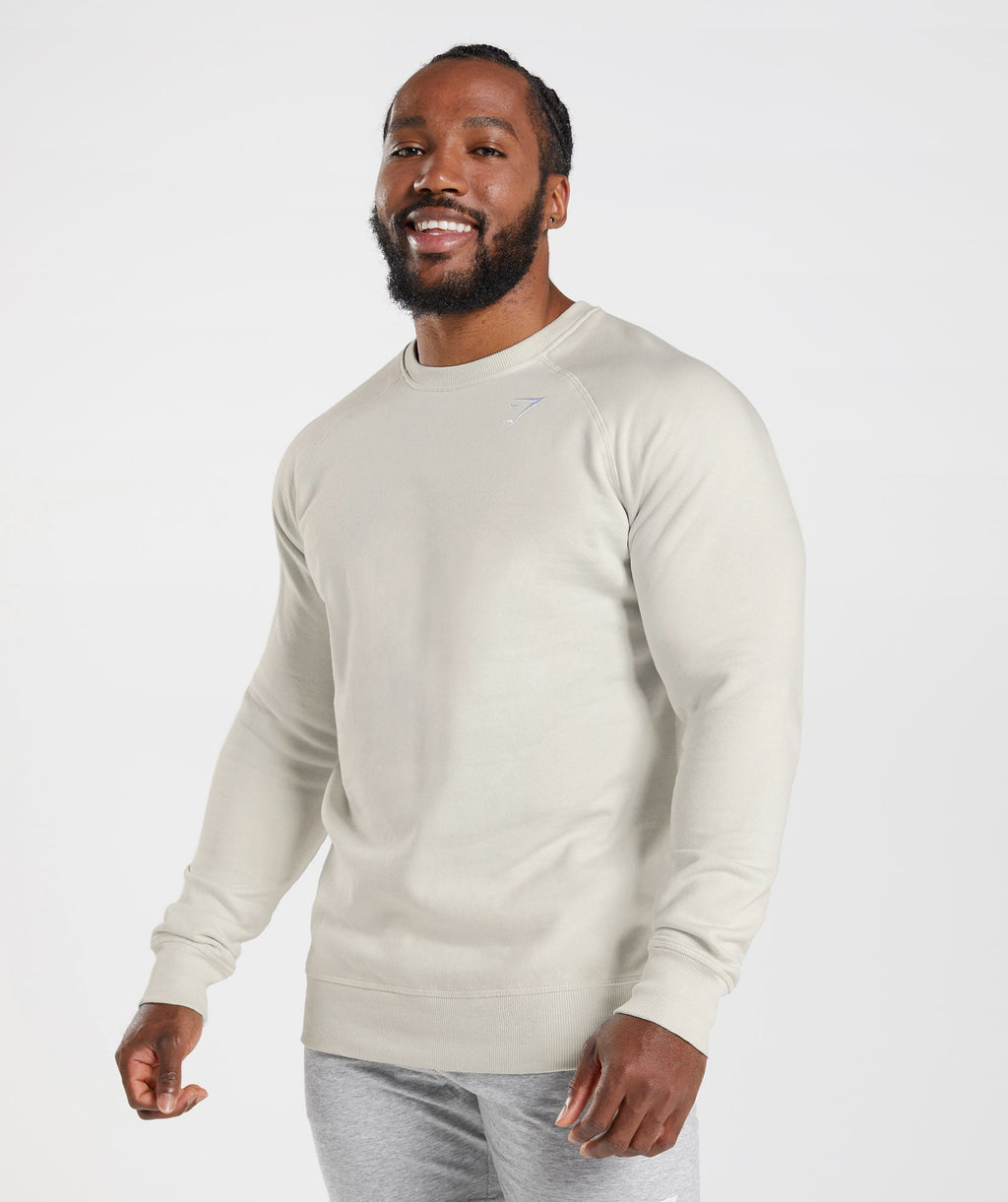 gymshark-crest-sweatshirt-pebble-grey-aw22