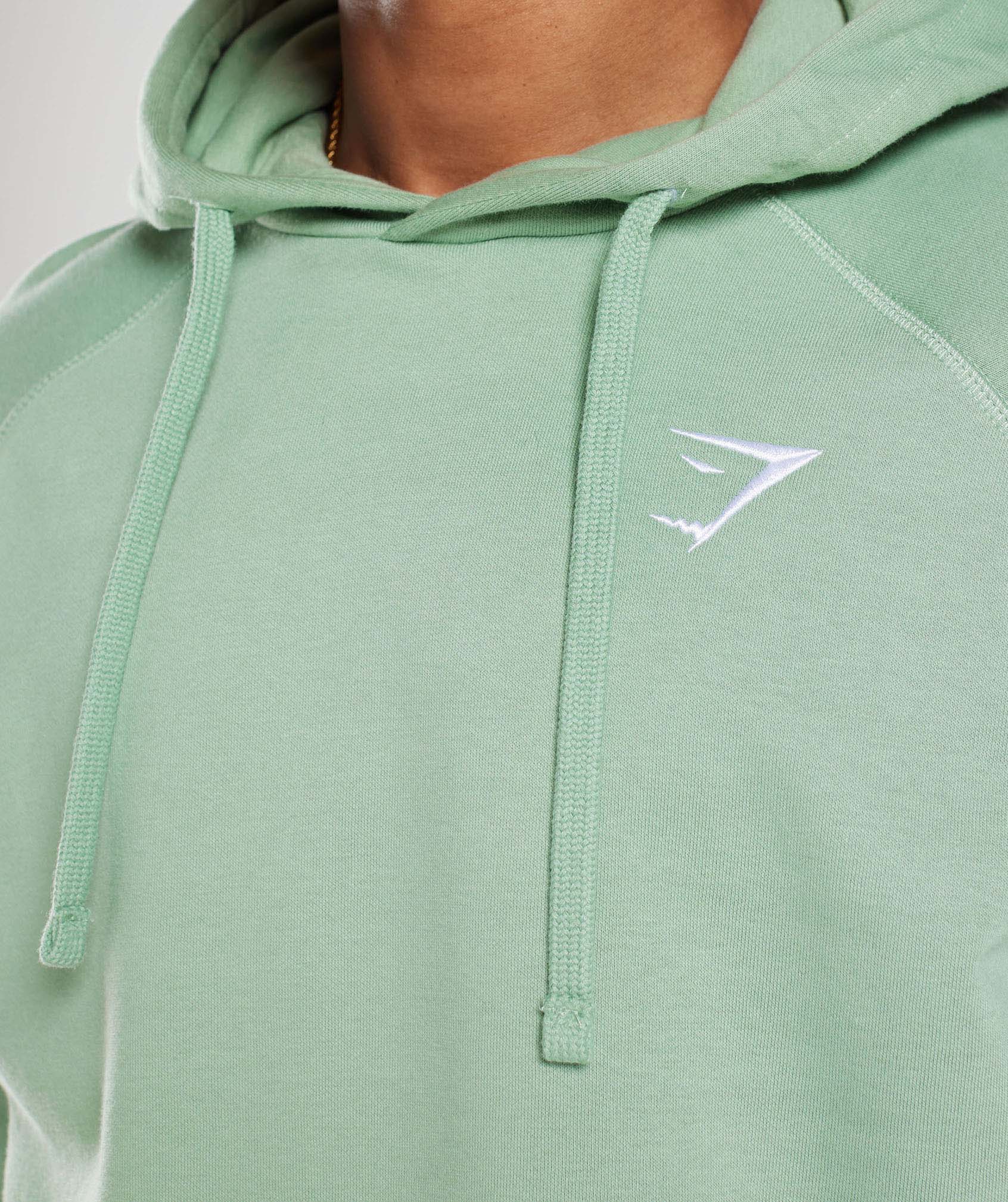 gymshark-crest-hoodie-desert-sage-green-ss23