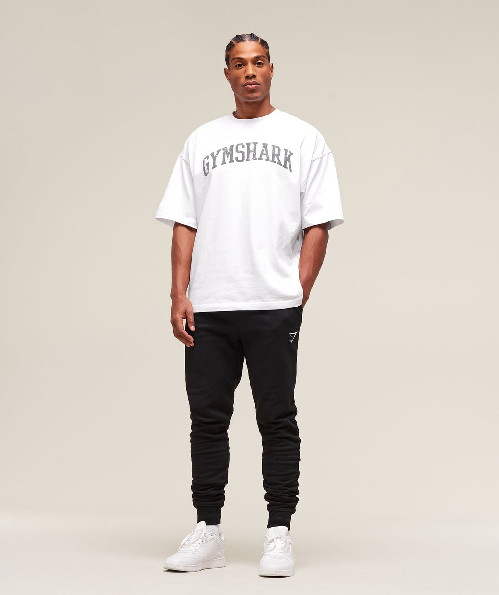gymshark-crest-tall-joggers-black-ss25