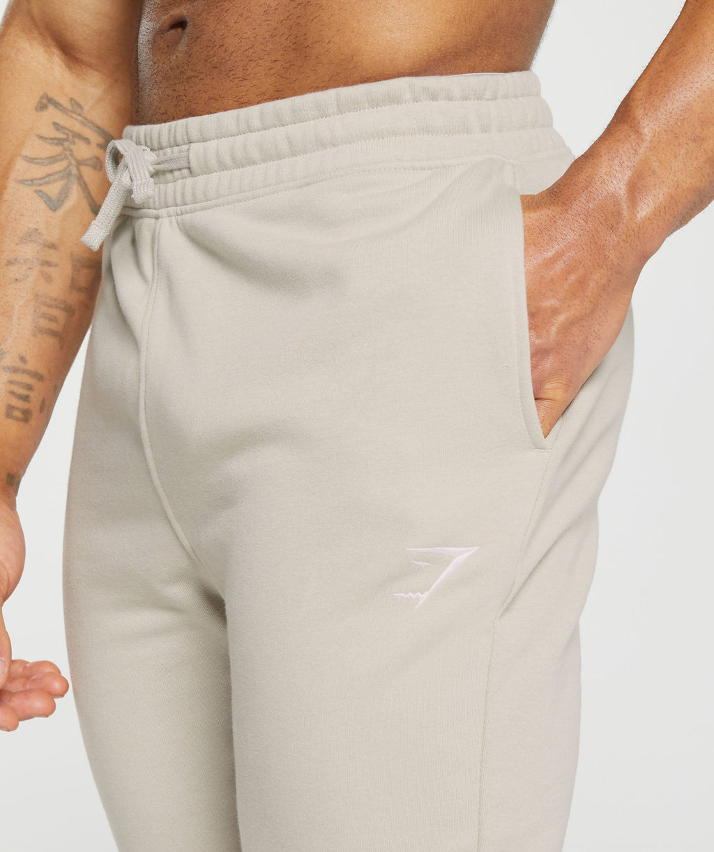 gymshark-crest-joggers-pebble-grey-aw22