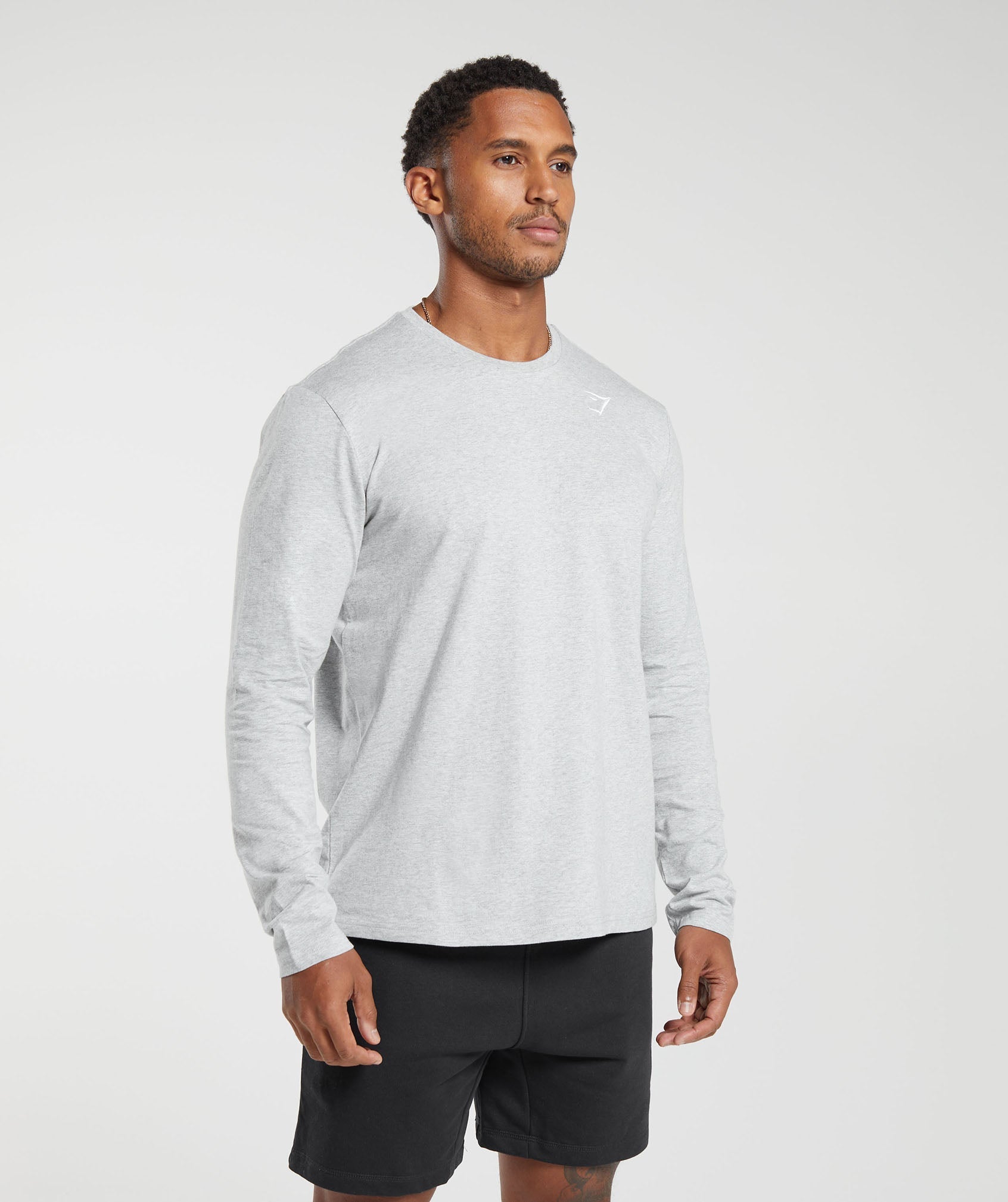 gymshark-crest-long-sleeve-t-shirt-light-grey-marl-aw23