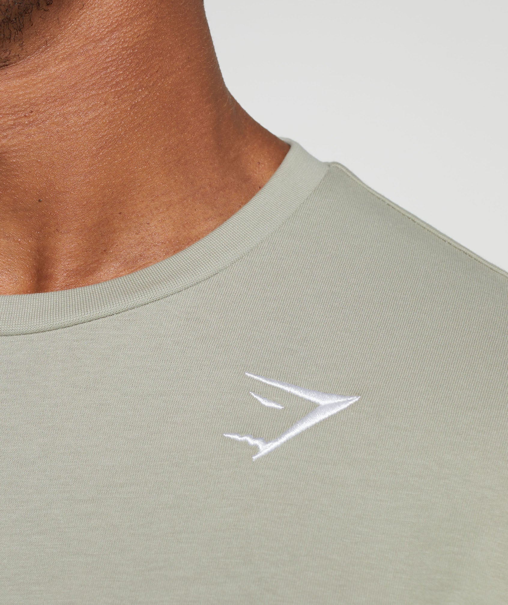 gymshark-crest-long-sleeve-t-shirt-stone-grey-aw23