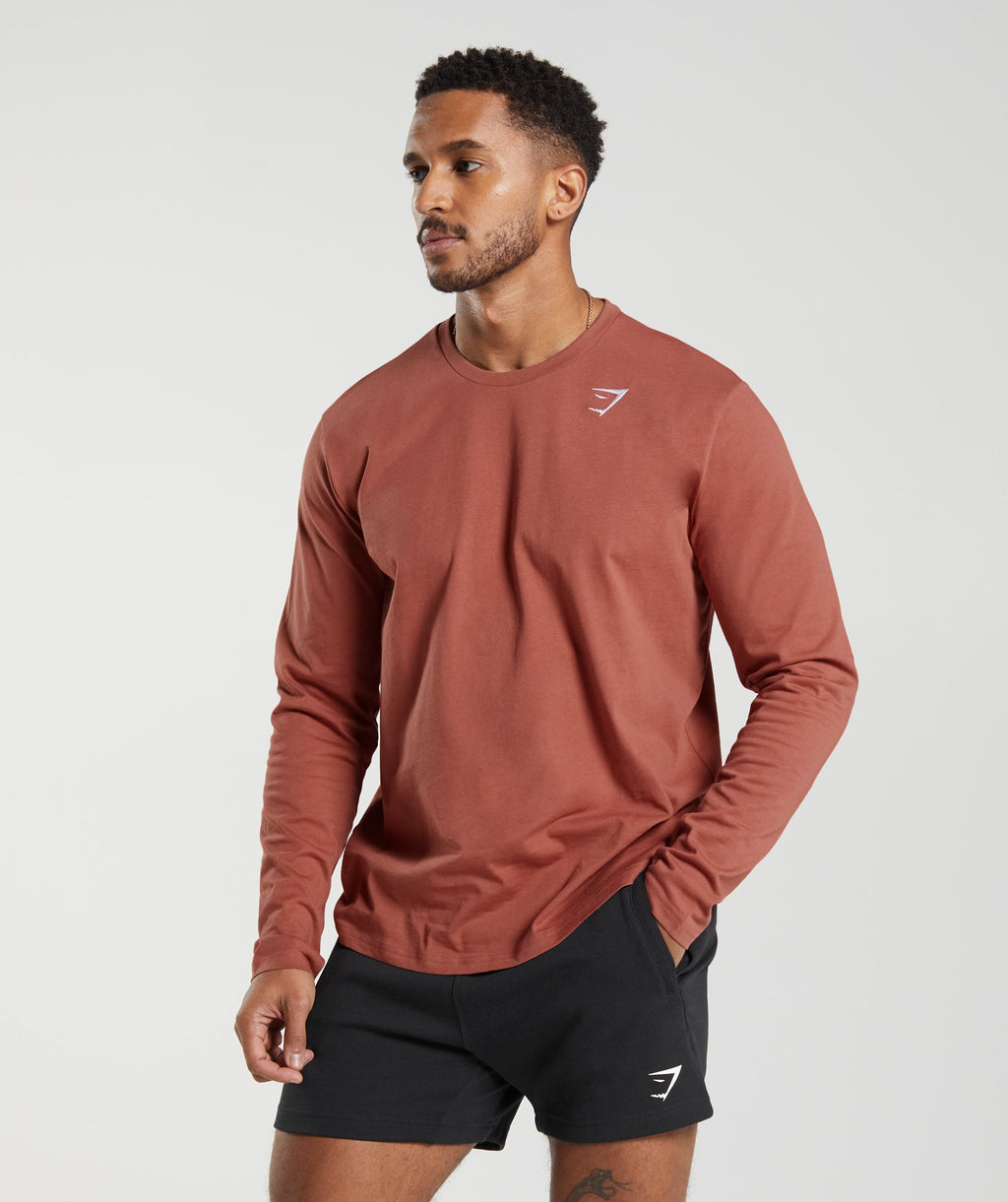 gymshark-crest-long-sleeve-t-shirt-persimmon-red-ss23