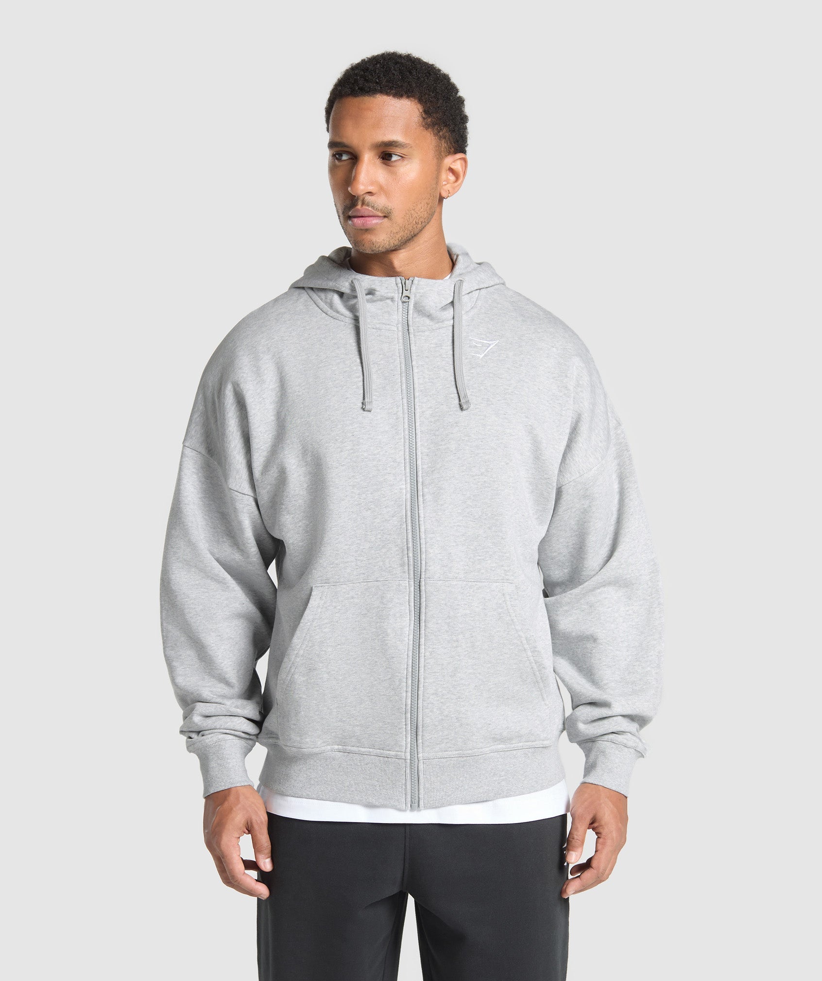 gymshark-crest-oversized-zip-up-hoodie-light-grey-core-marl-ss25
