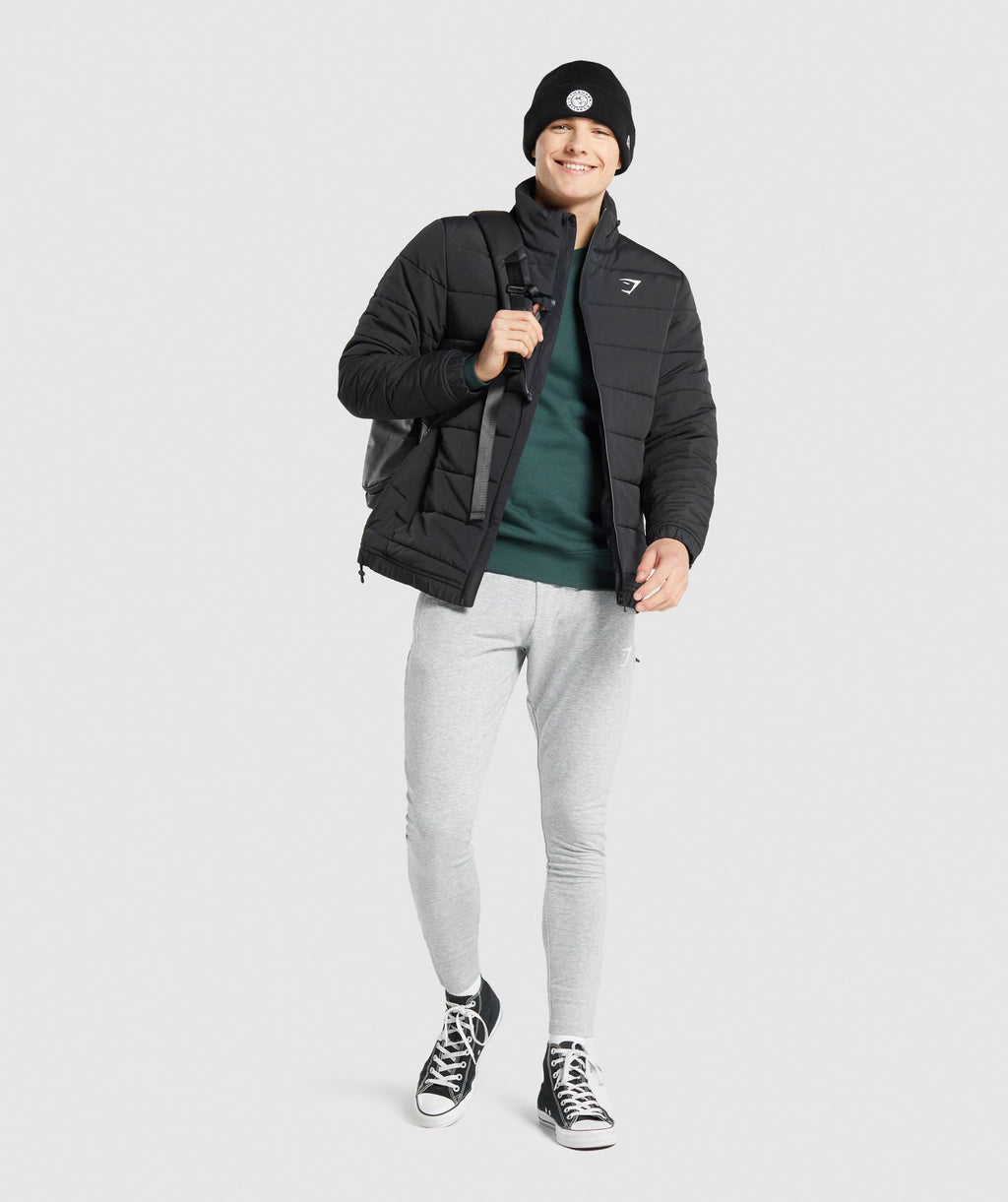 gymshark-crest-puffer-jacket-black-aw21
