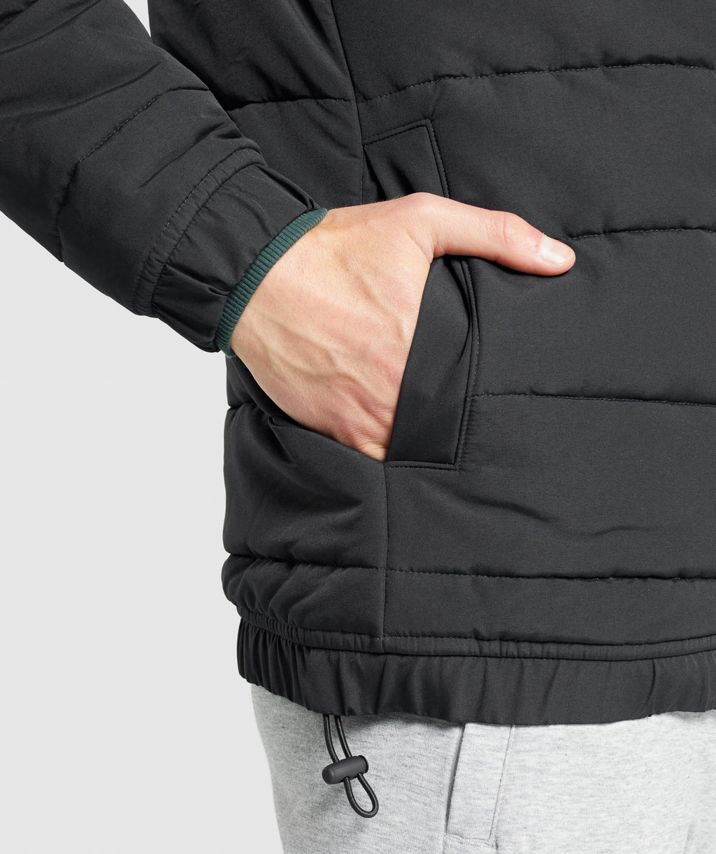 gymshark-crest-puffer-jacket-black-aw21