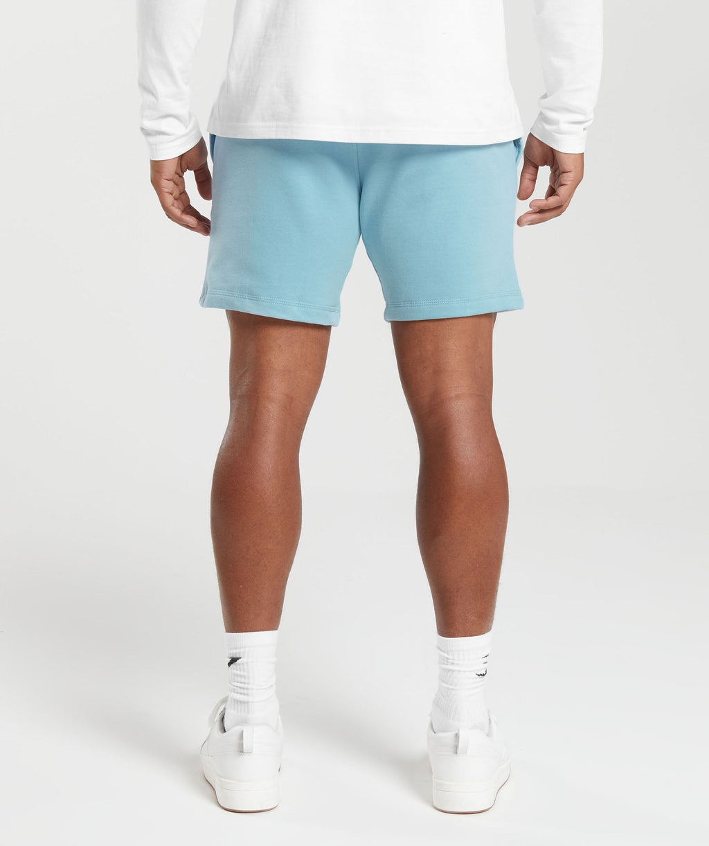 gymshark-crest-7-shorts-iceberg-blue-ss23