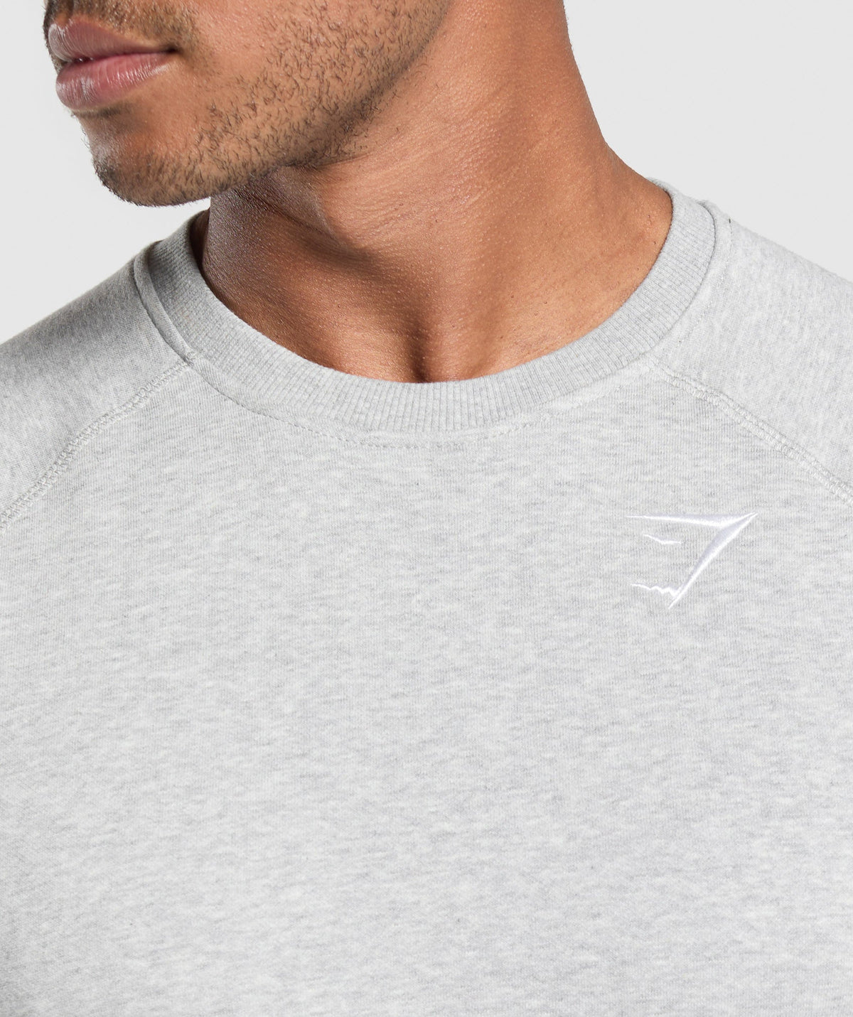 gymshark-crest-sweatshirt-light-grey-marl-aw22