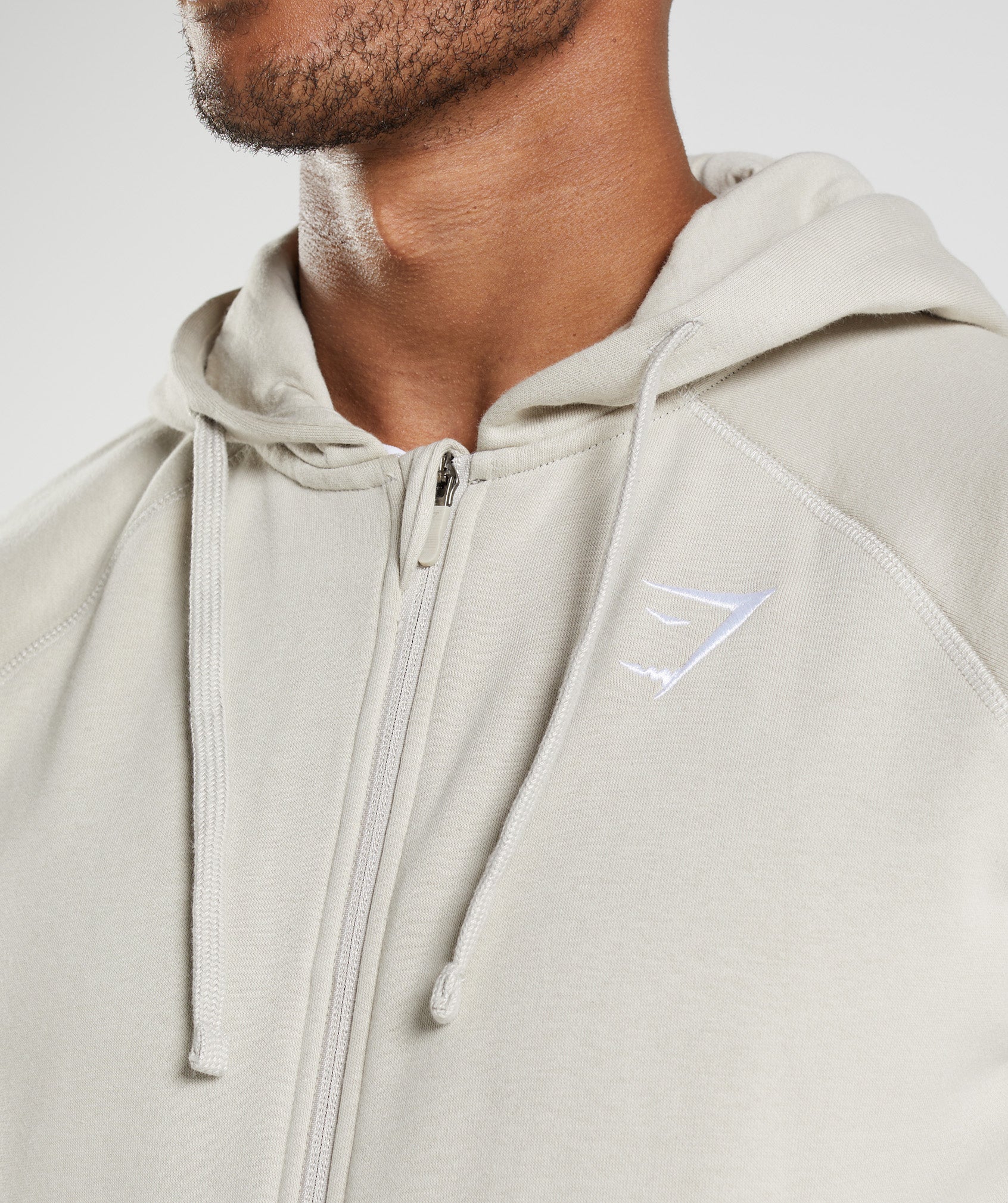 gymshark-crest-zip-up-hoodie-pebble-grey-aw22
