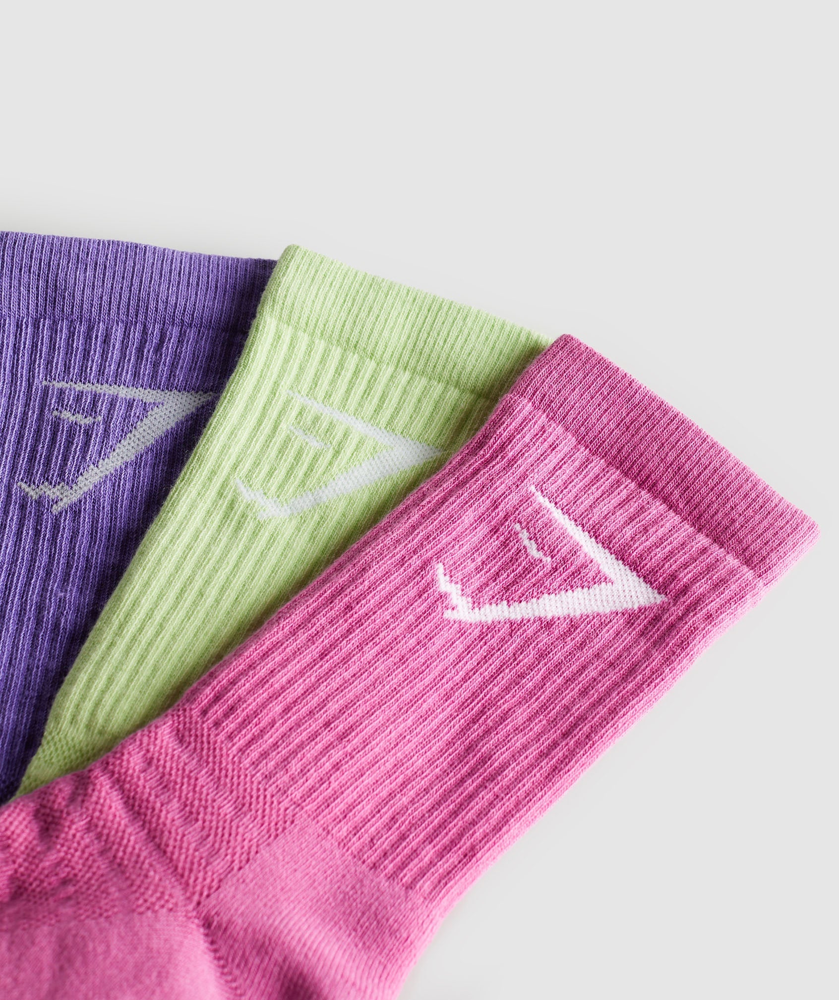 gymshark-crew-socks-3pk-pastel-sage-green-shelly-pink-stellar-purple-ss24