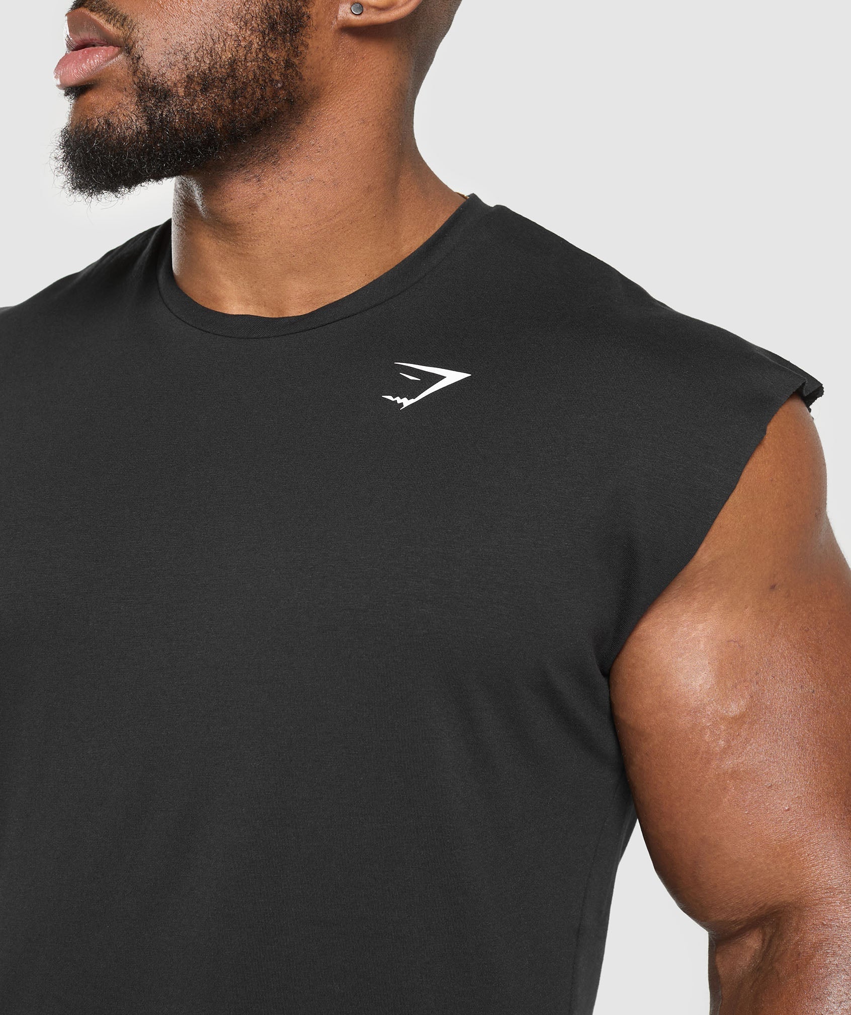 gymshark-critical-cut-off-tank-black-ss25