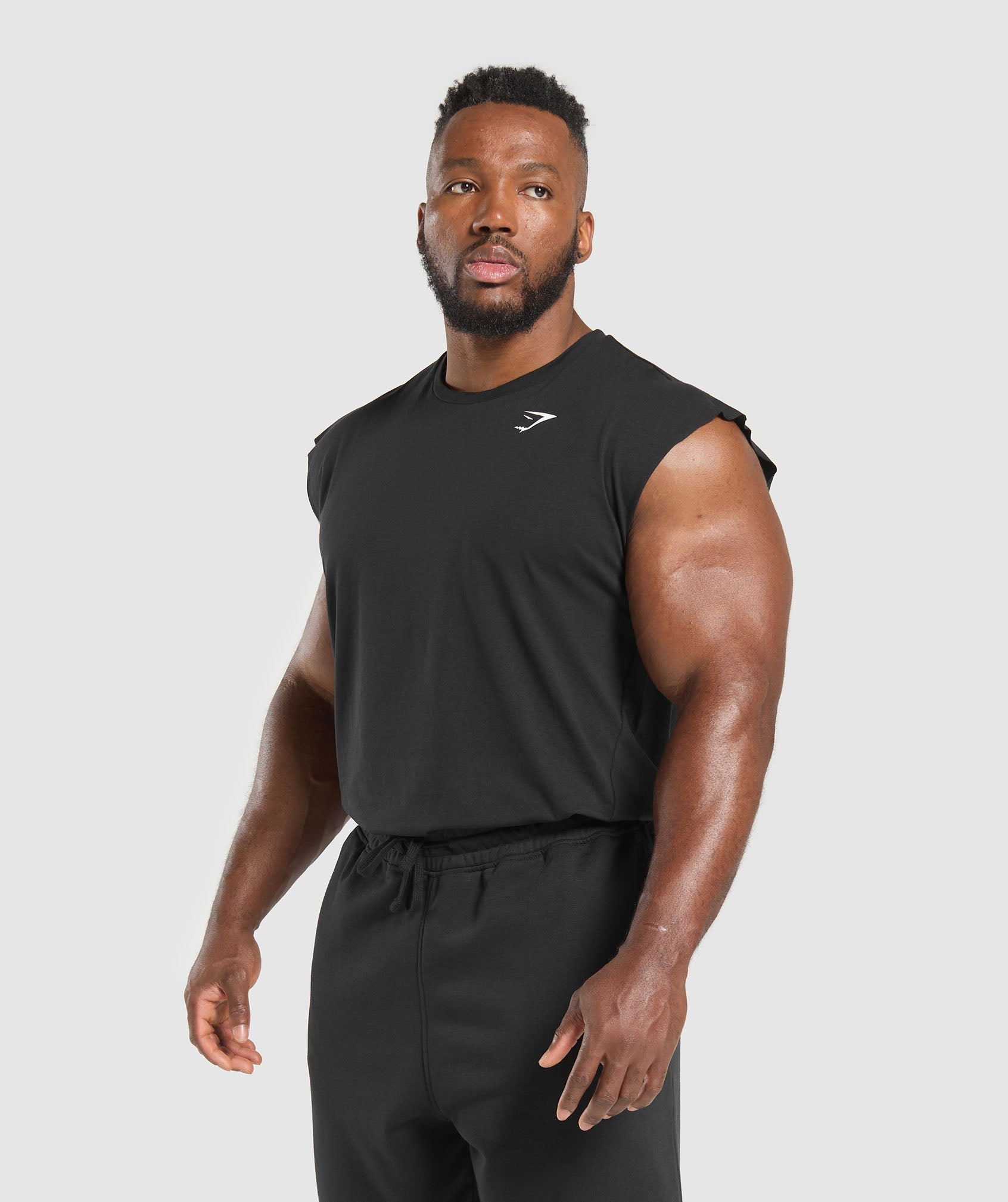 gymshark-critical-cut-off-tank-black-ss25