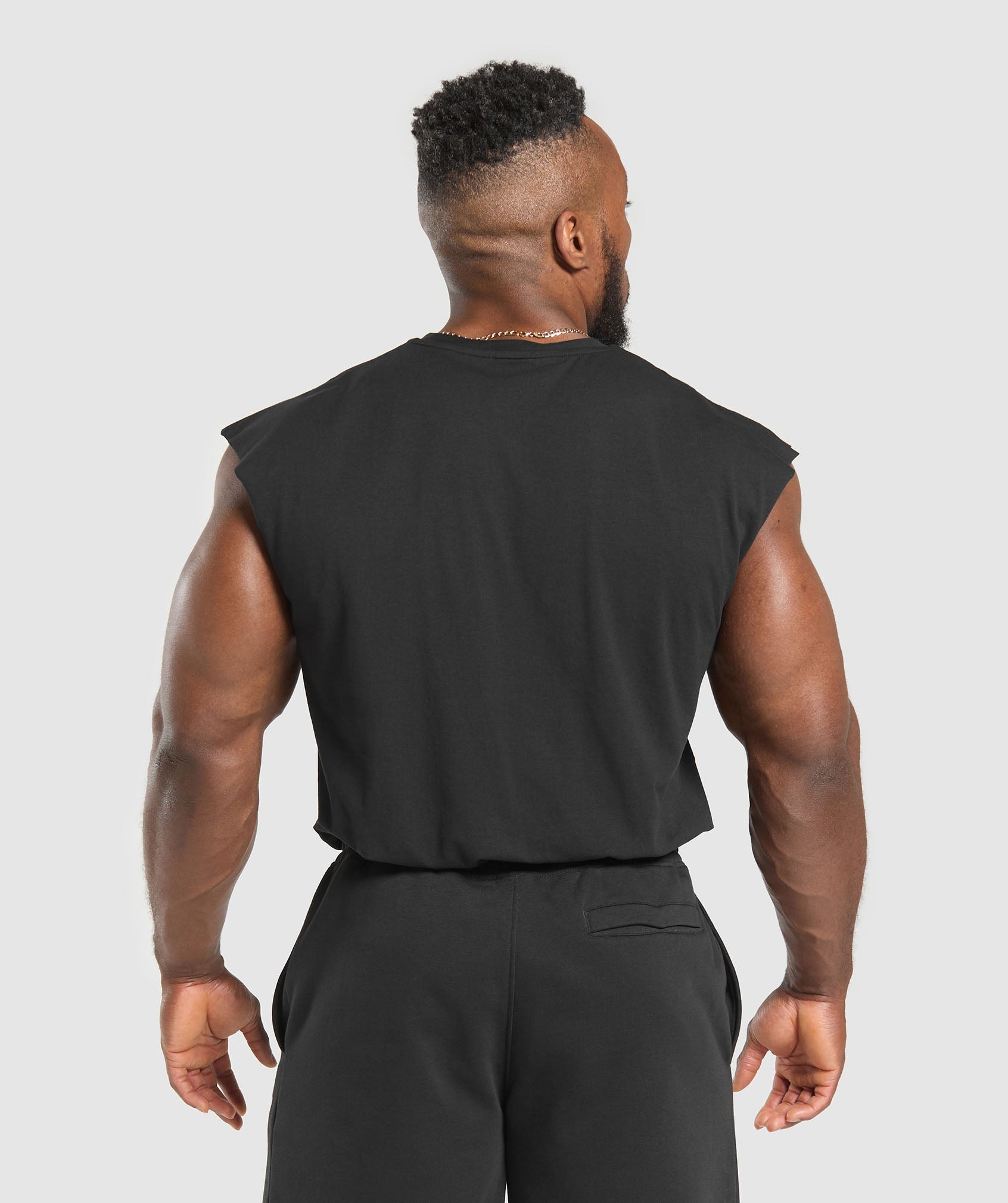 gymshark-critical-cut-off-tank-black-ss25