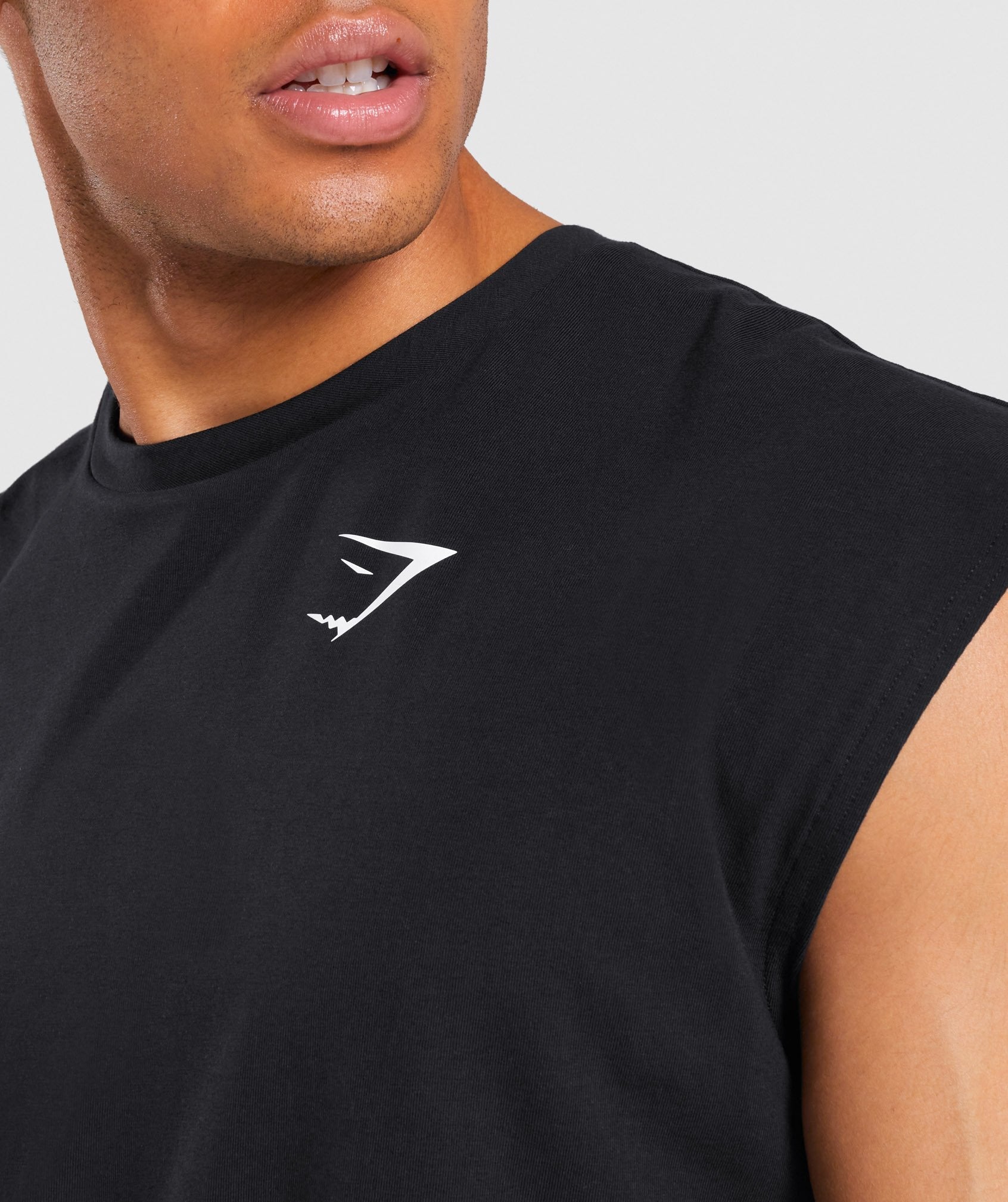 gymshark-critical-cut-off-sleeveless-tee-black