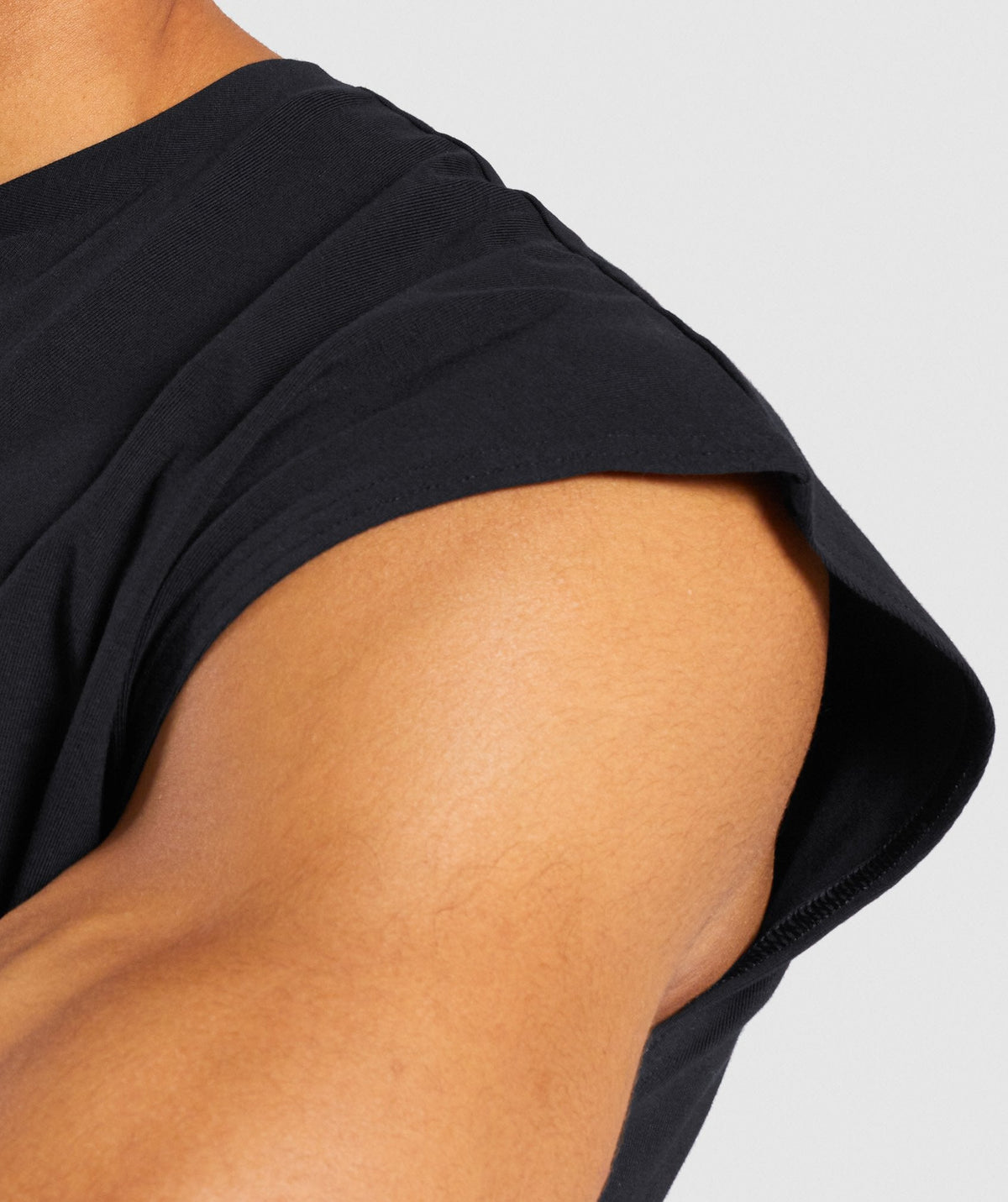 gymshark-critical-cut-off-sleeveless-tee-black