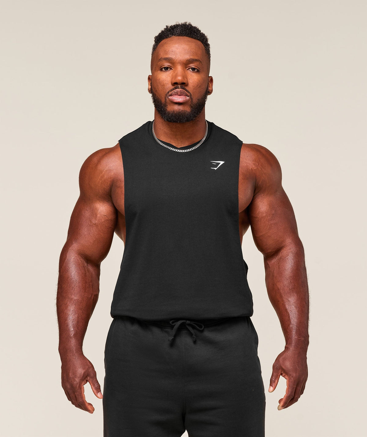 gymshark-critical-drop-arm-tank-black-ss25