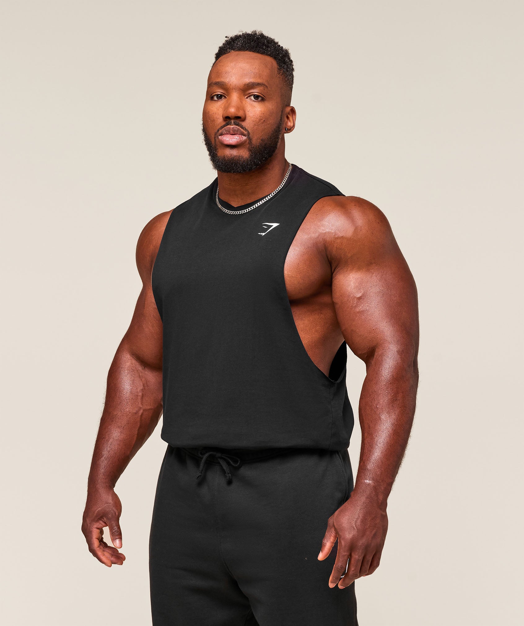 gymshark-critical-drop-arm-tank-black-ss25