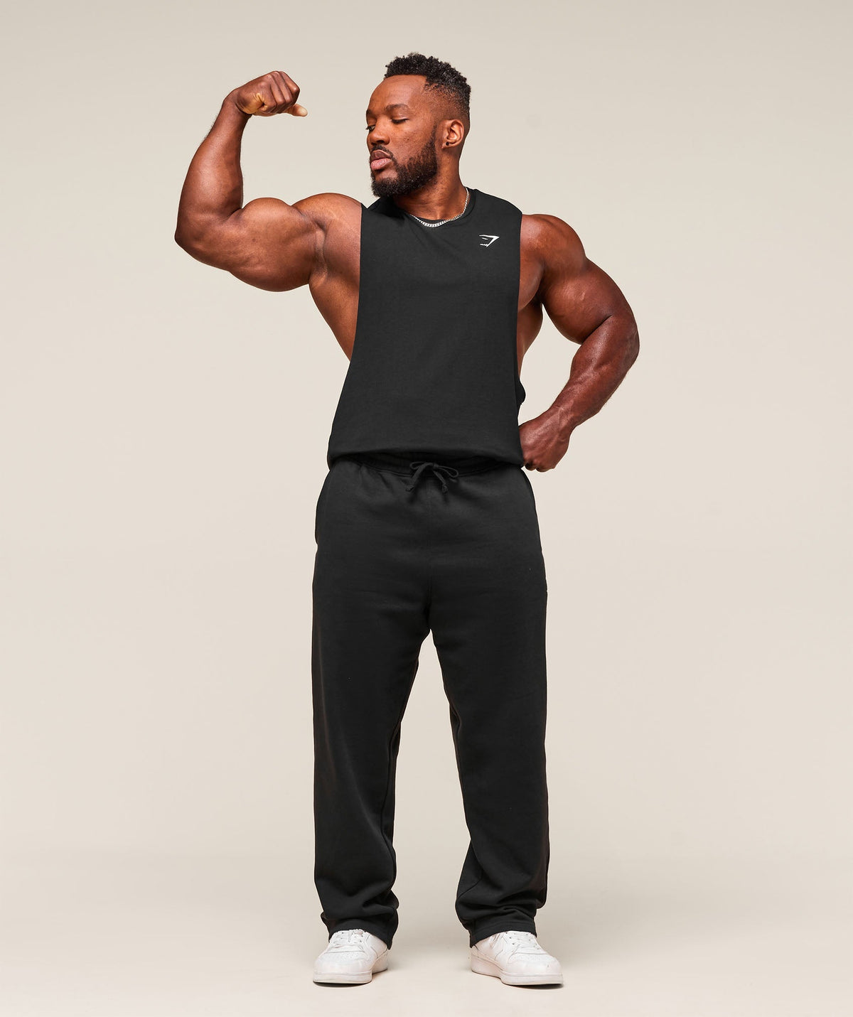 gymshark-critical-drop-arm-tank-black-ss25