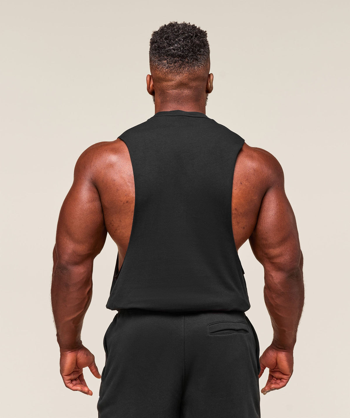 gymshark-critical-drop-arm-tank-black-ss25