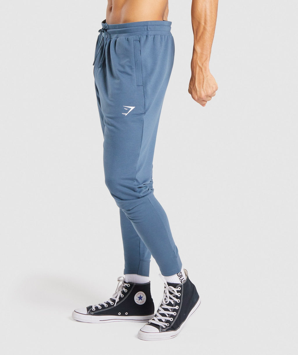 gymshark-critical-zip-joggers-teal