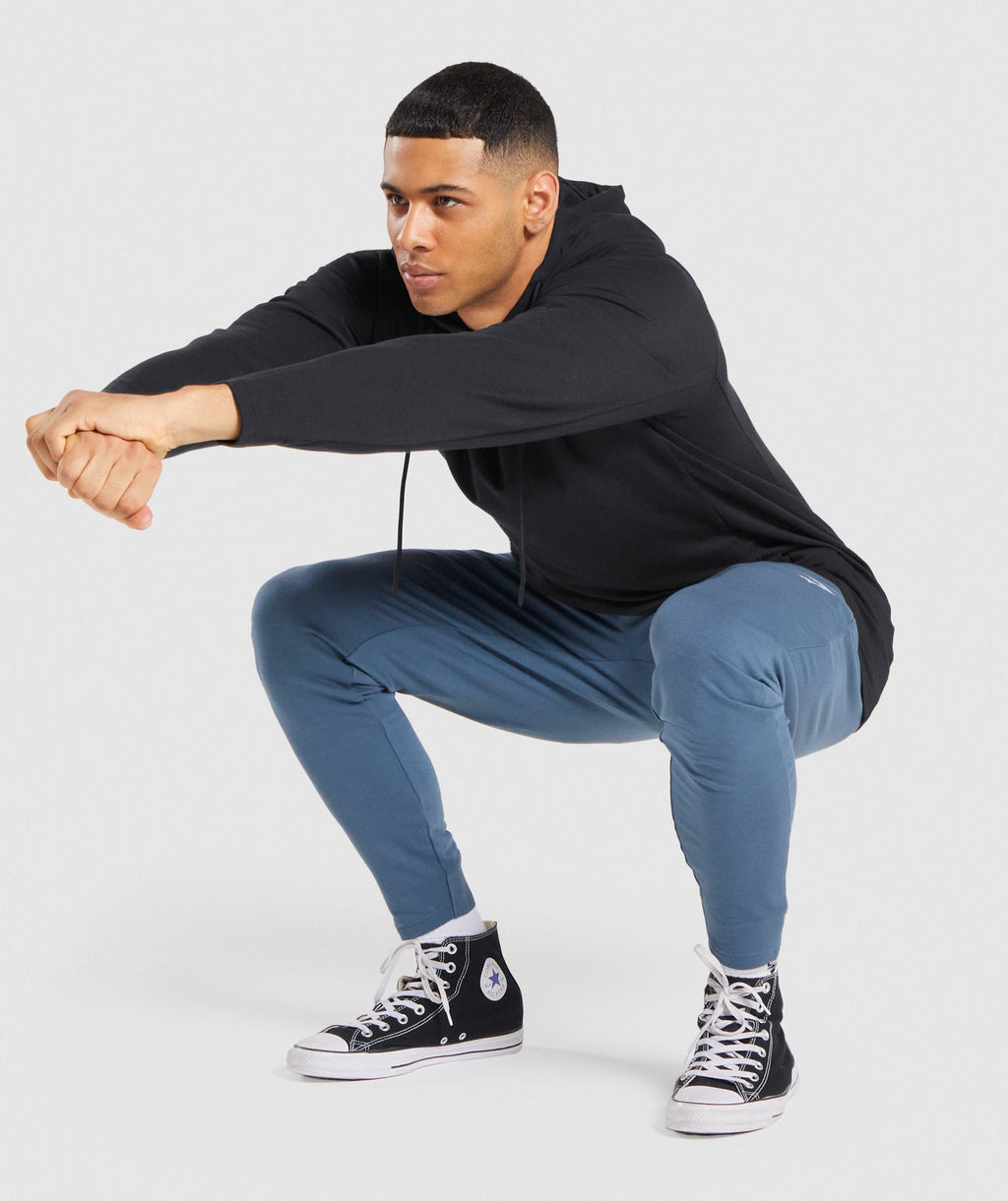 gymshark-critical-zip-joggers-teal