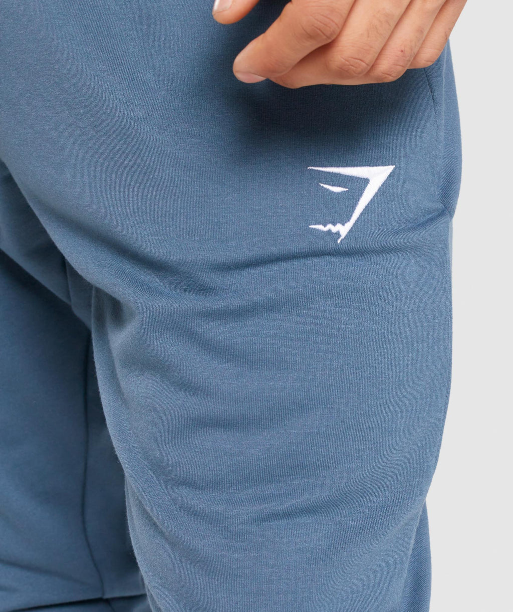 gymshark-critical-zip-joggers-teal