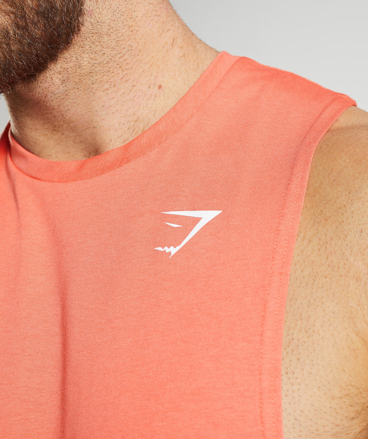 gymshark-react-drop-arm-tank-aerospace-orange-ss23
